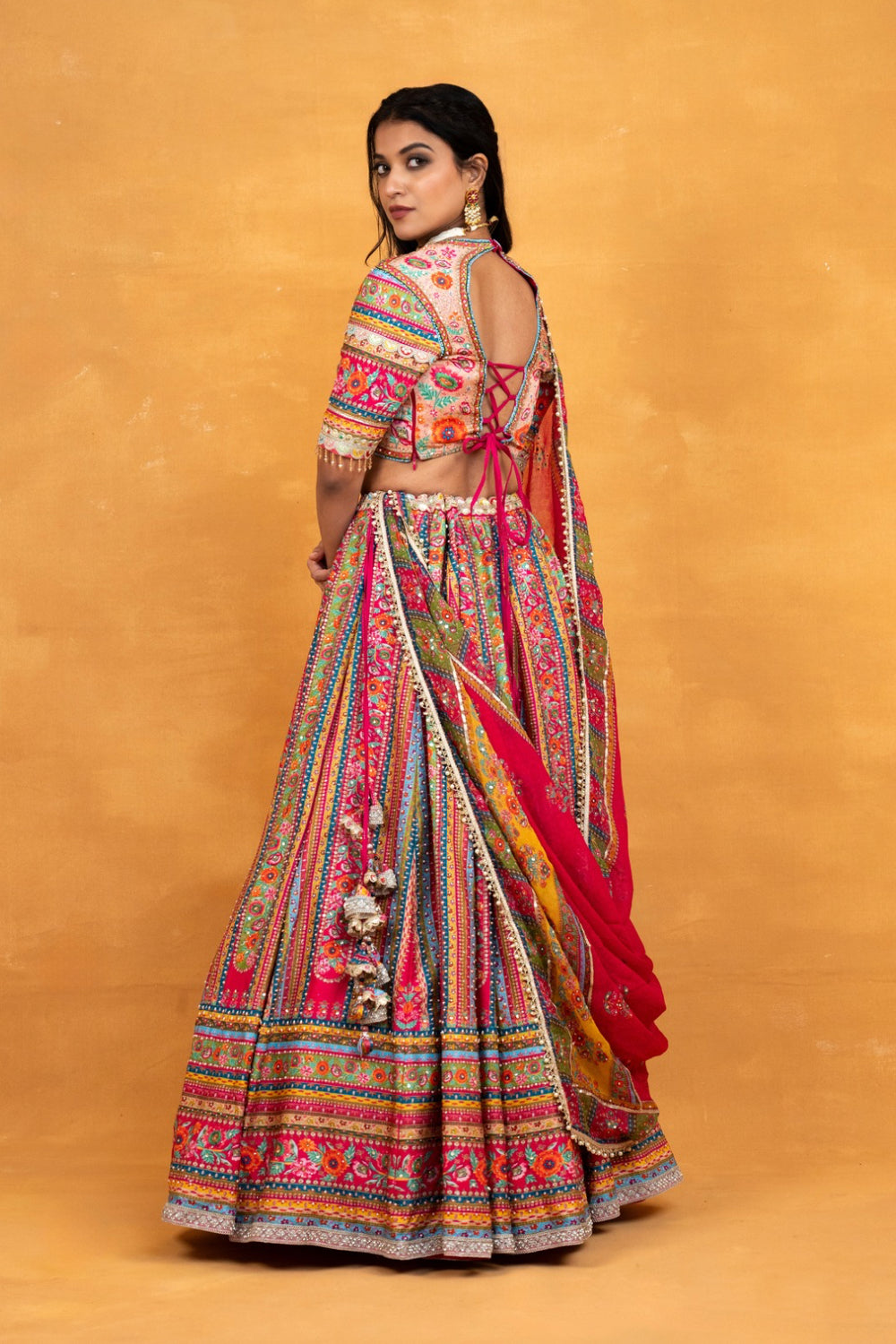 Multicolour printed soft silk lehenga choli with hand cut dana and pearls