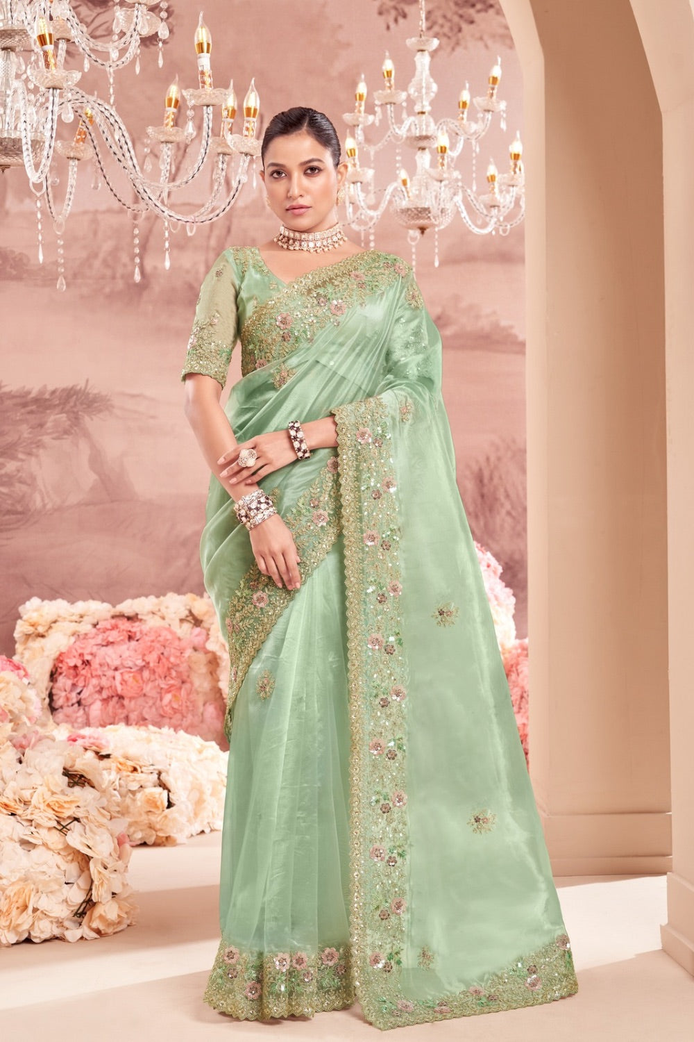 Sea green soft silk saree with matching unstitched blouse