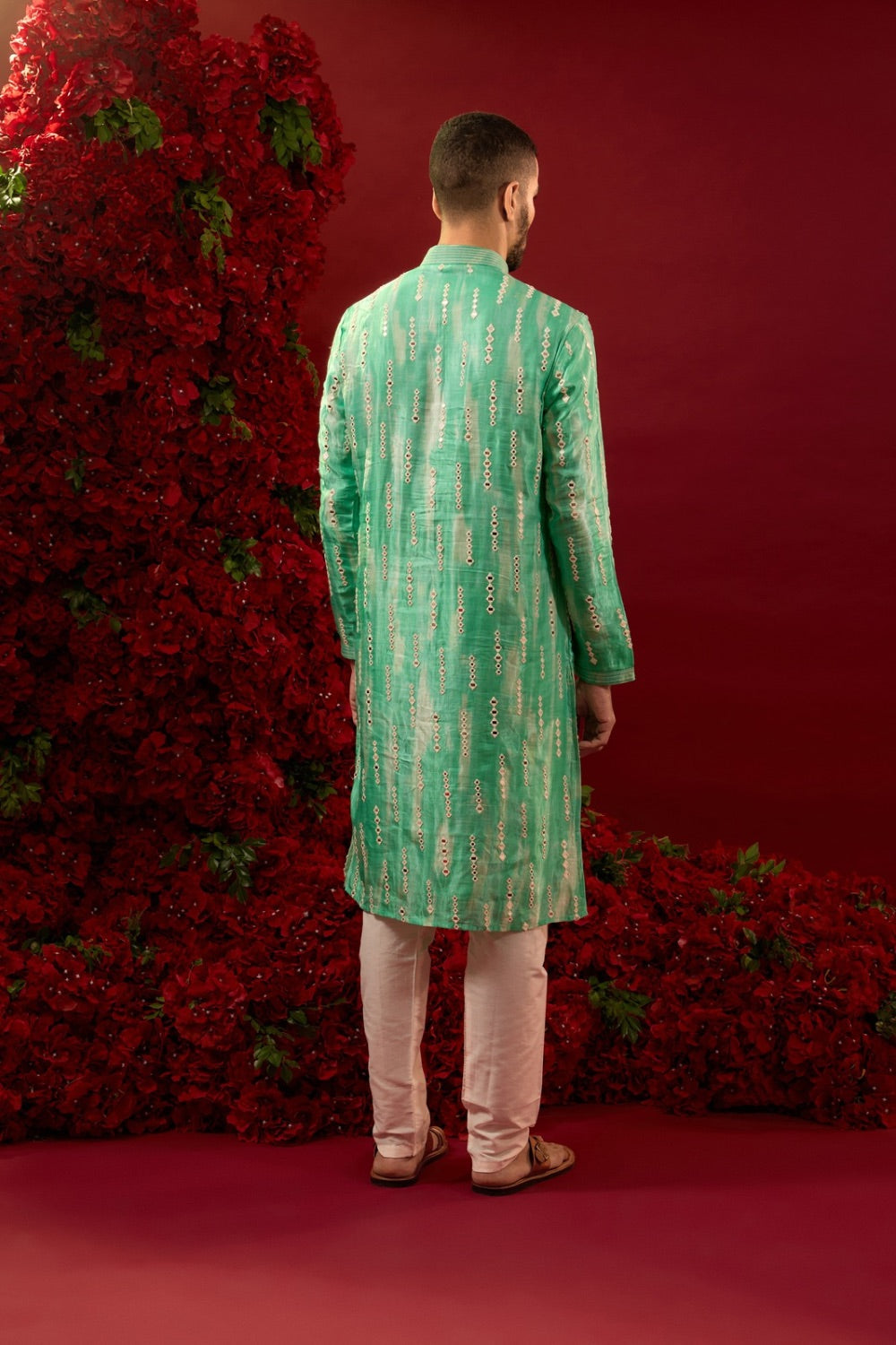 Green silk kurta pajama with hand & machine work