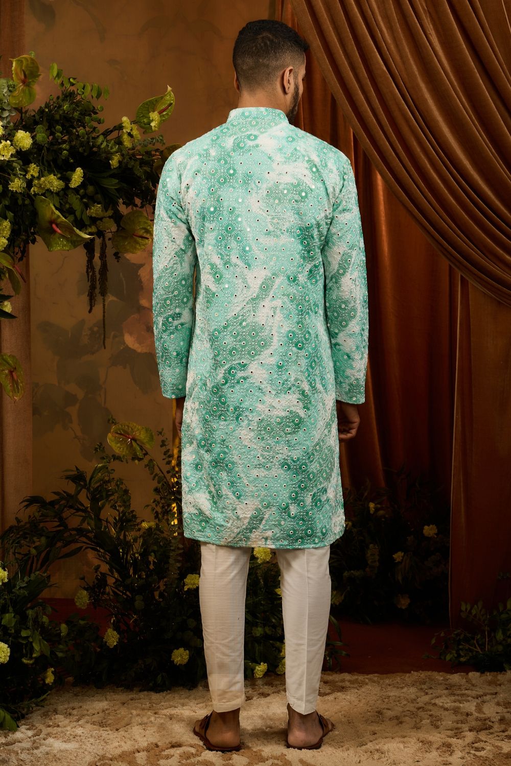 Blue silk kurta pajama set with white embroidery and mirror machine work