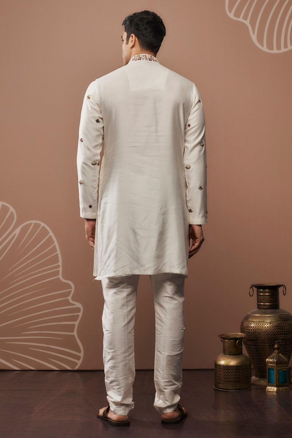 White silk kurta set with hand and machine work