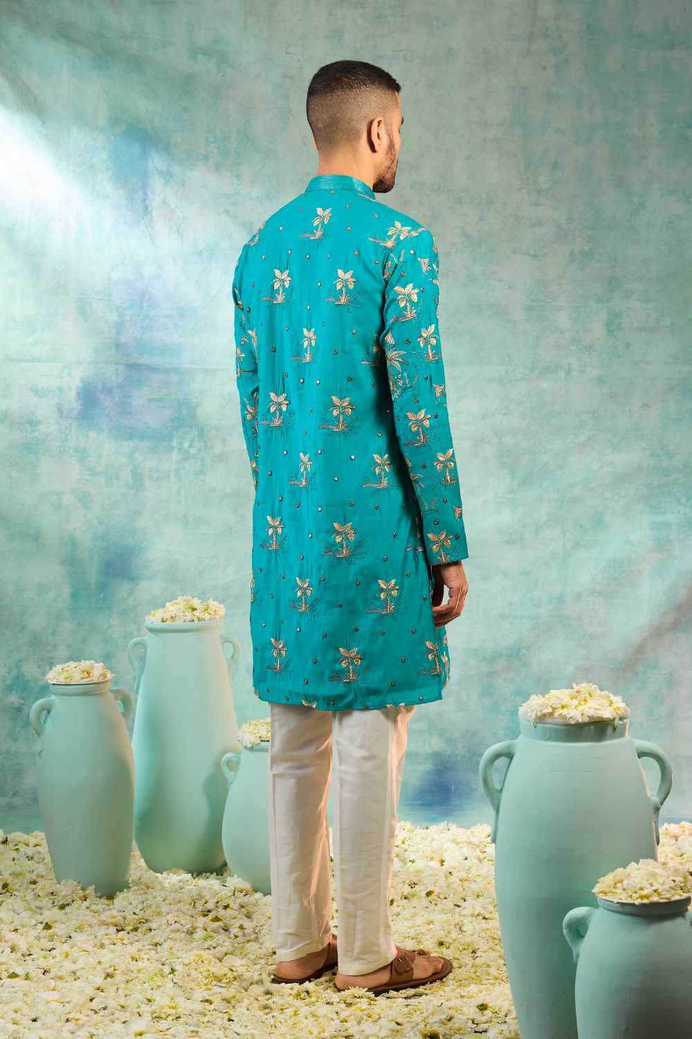 Turquoise silk kurta set with golden details