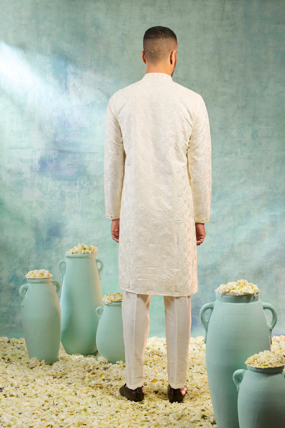 Ivory kurta set with thread embroidery and mirror work