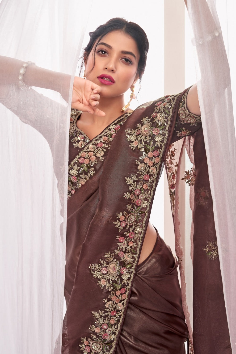 Brown soft silk saree with matching unstitched blouse