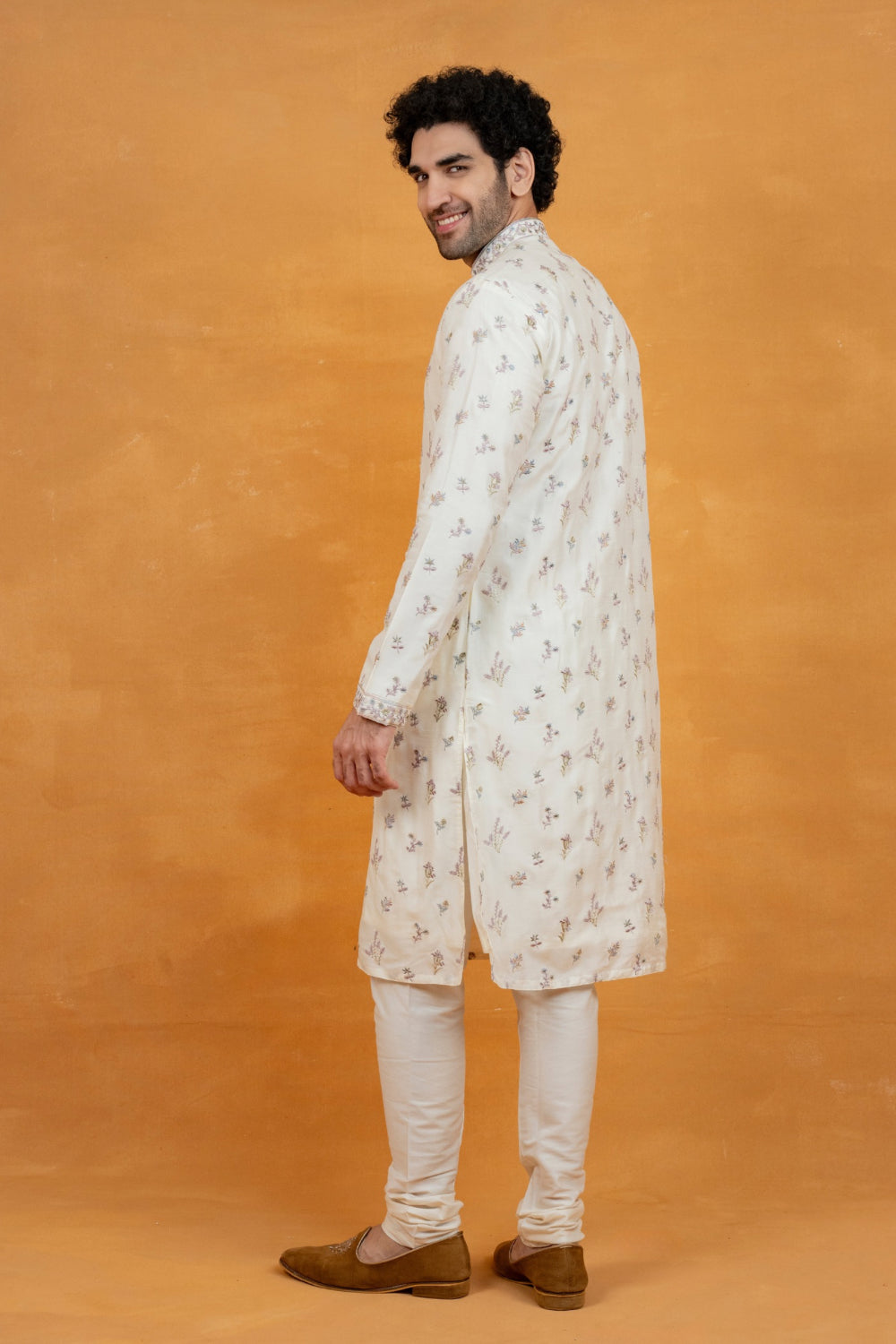 Off-White silk kurta set with resham embroidery and stone work