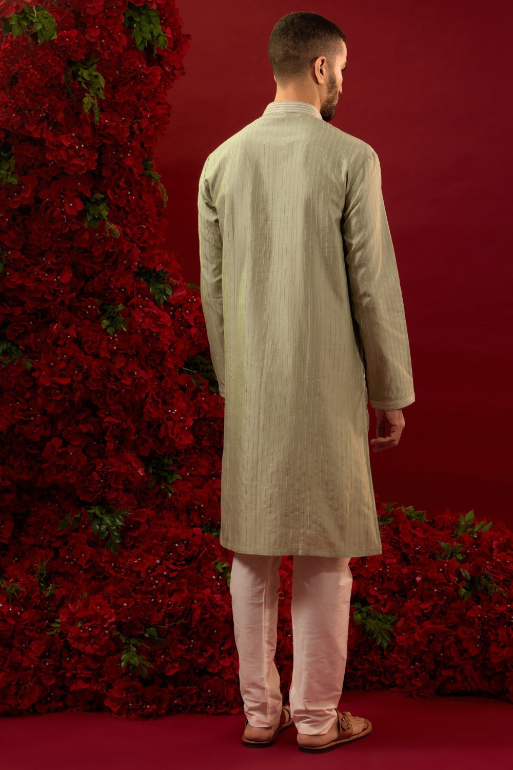 Sage green silk kurta set with machine work