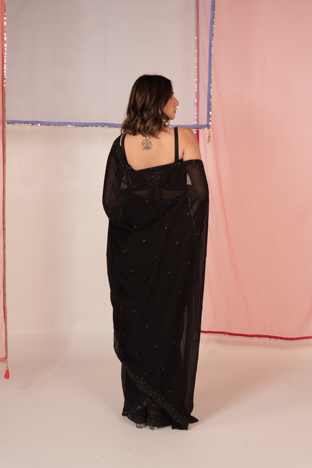 Black tissue silk saree and unstitched blouse piece