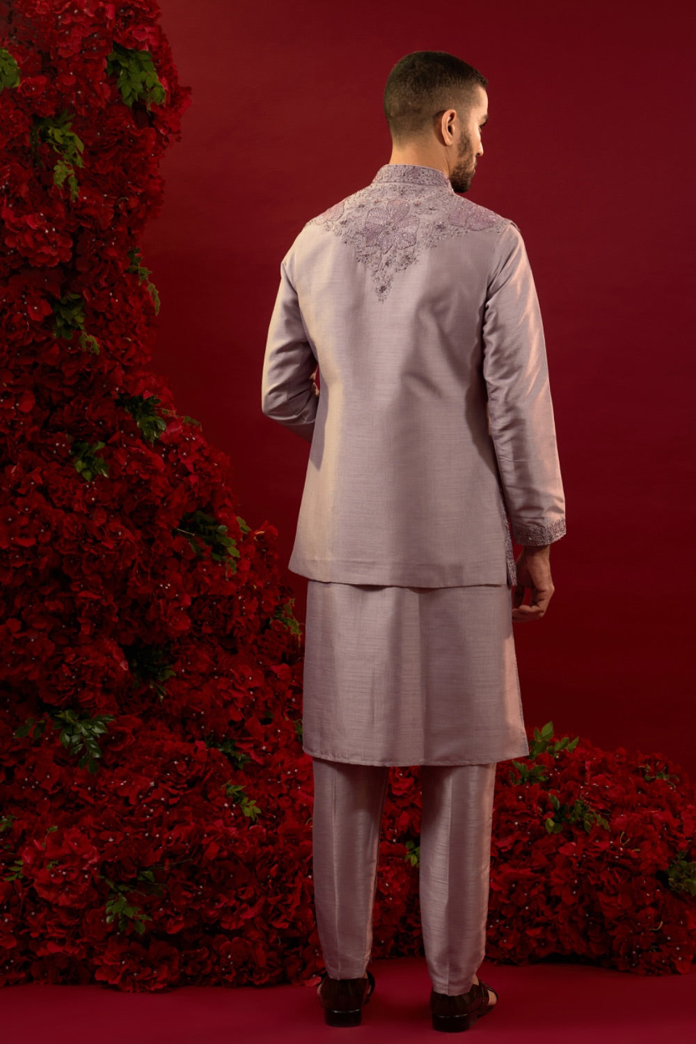 Mauve silk sherwani with detailed hand and machine work