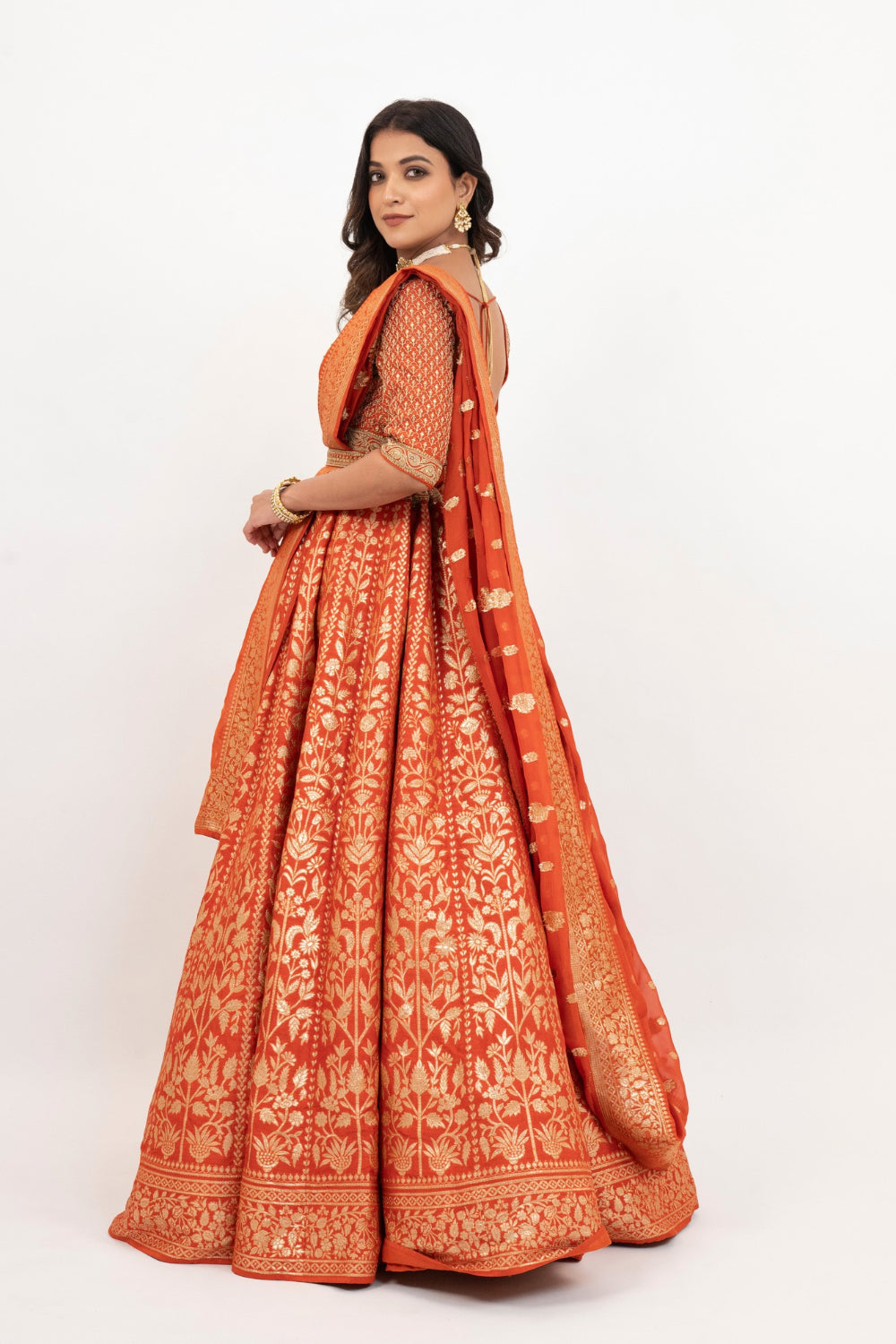 Orange banarasi silk zardozi embroidered lehenga choli with sequins work