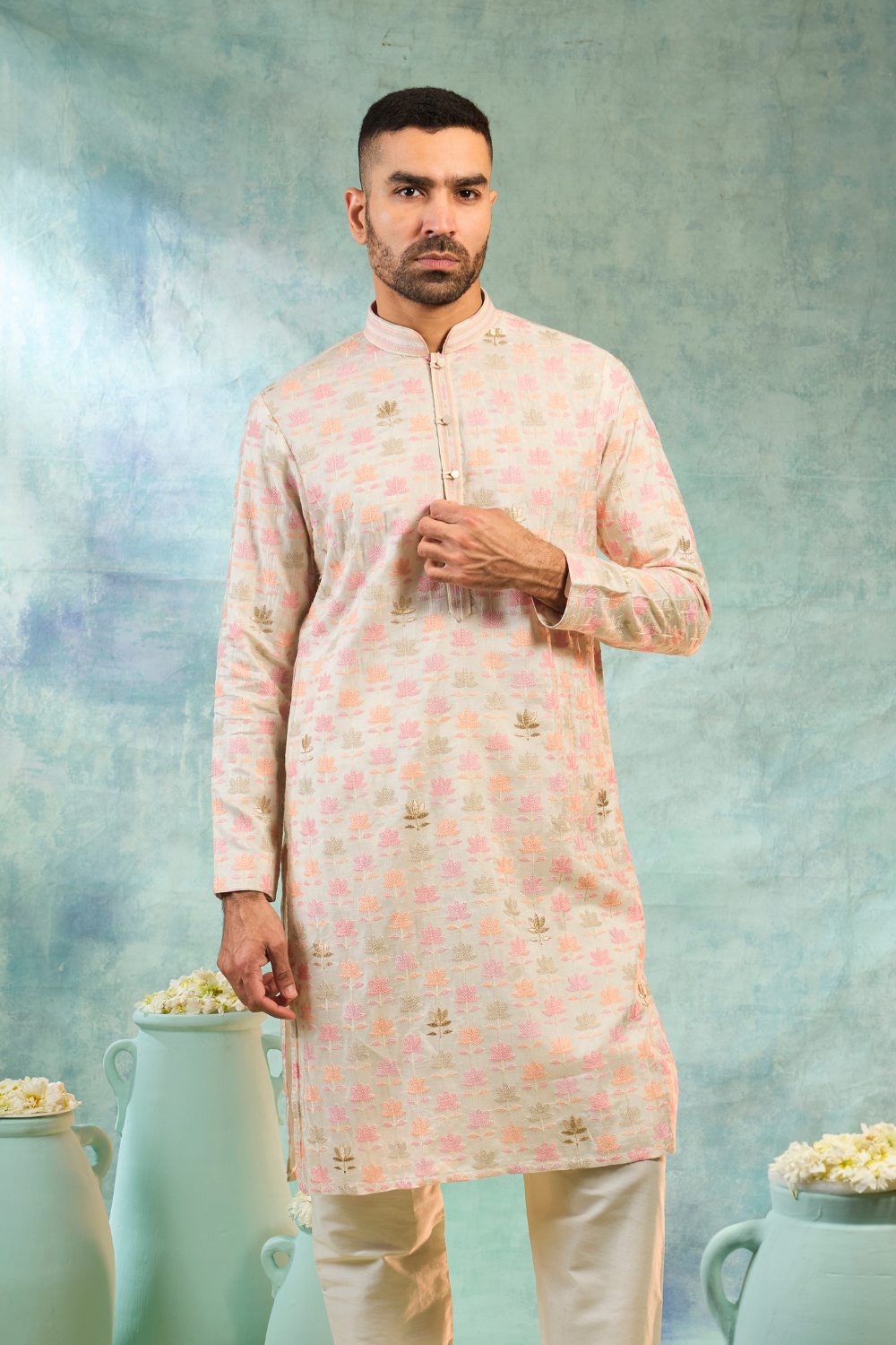 Ivory silk kurta set with baby pink and ivory thread work and golden butti