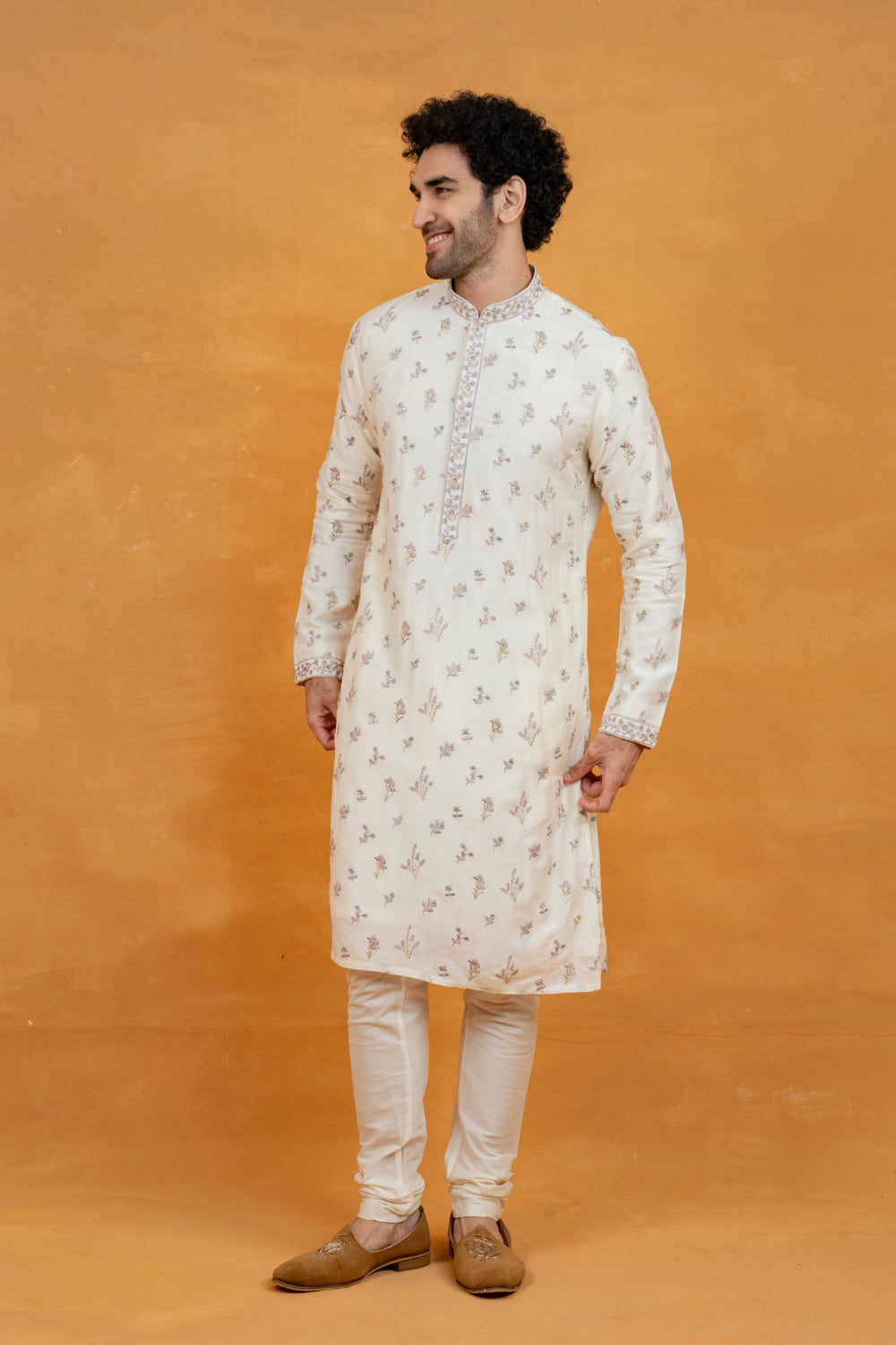 Off-White silk kurta set with resham embroidery and stone work