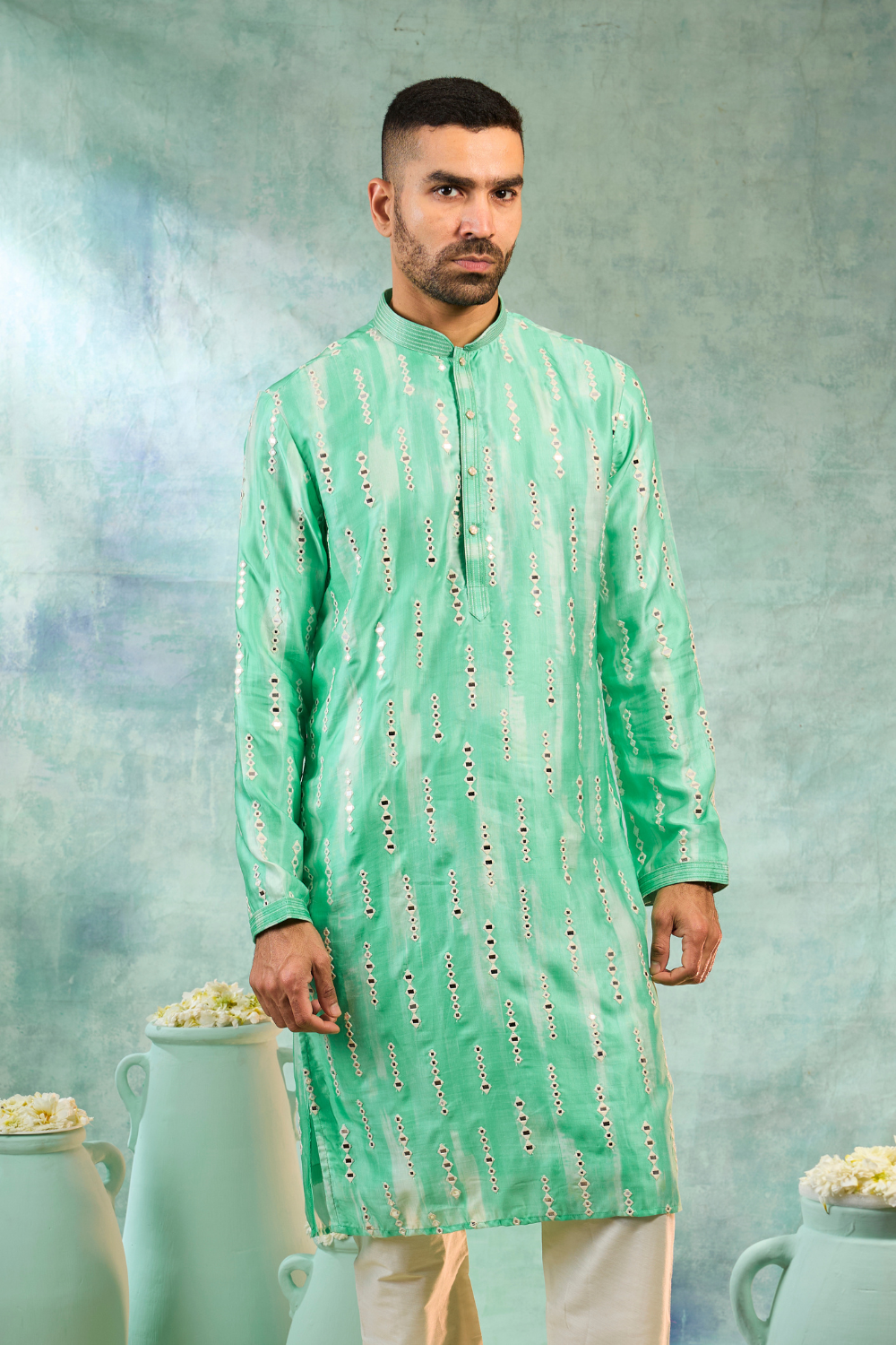 Sea green silk kurta set with off white thread work and mirror work