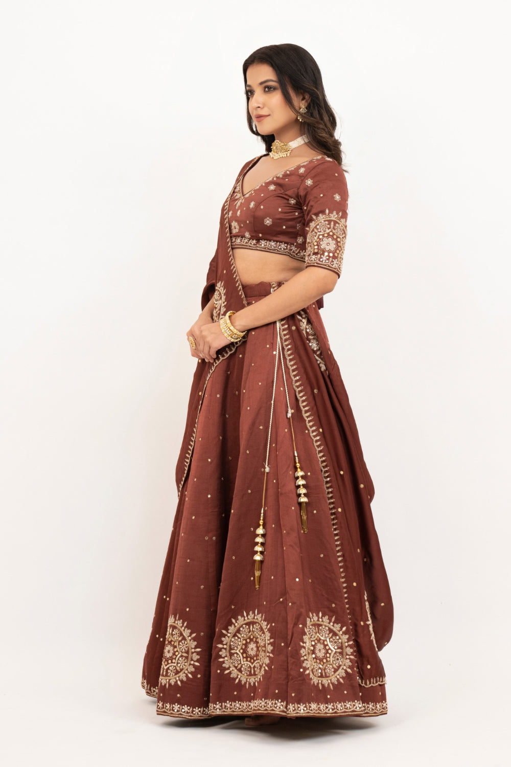 Brown soft silk zardozi embroidered lehenga choli with hand cut dana