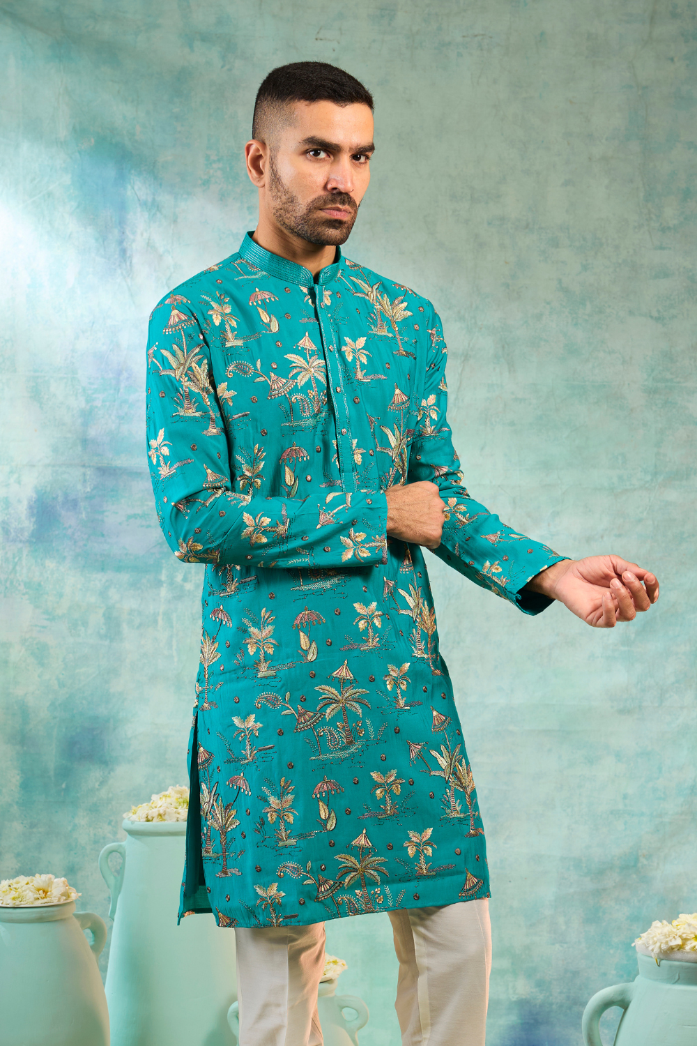 Turquoise silk kurta set with golden details