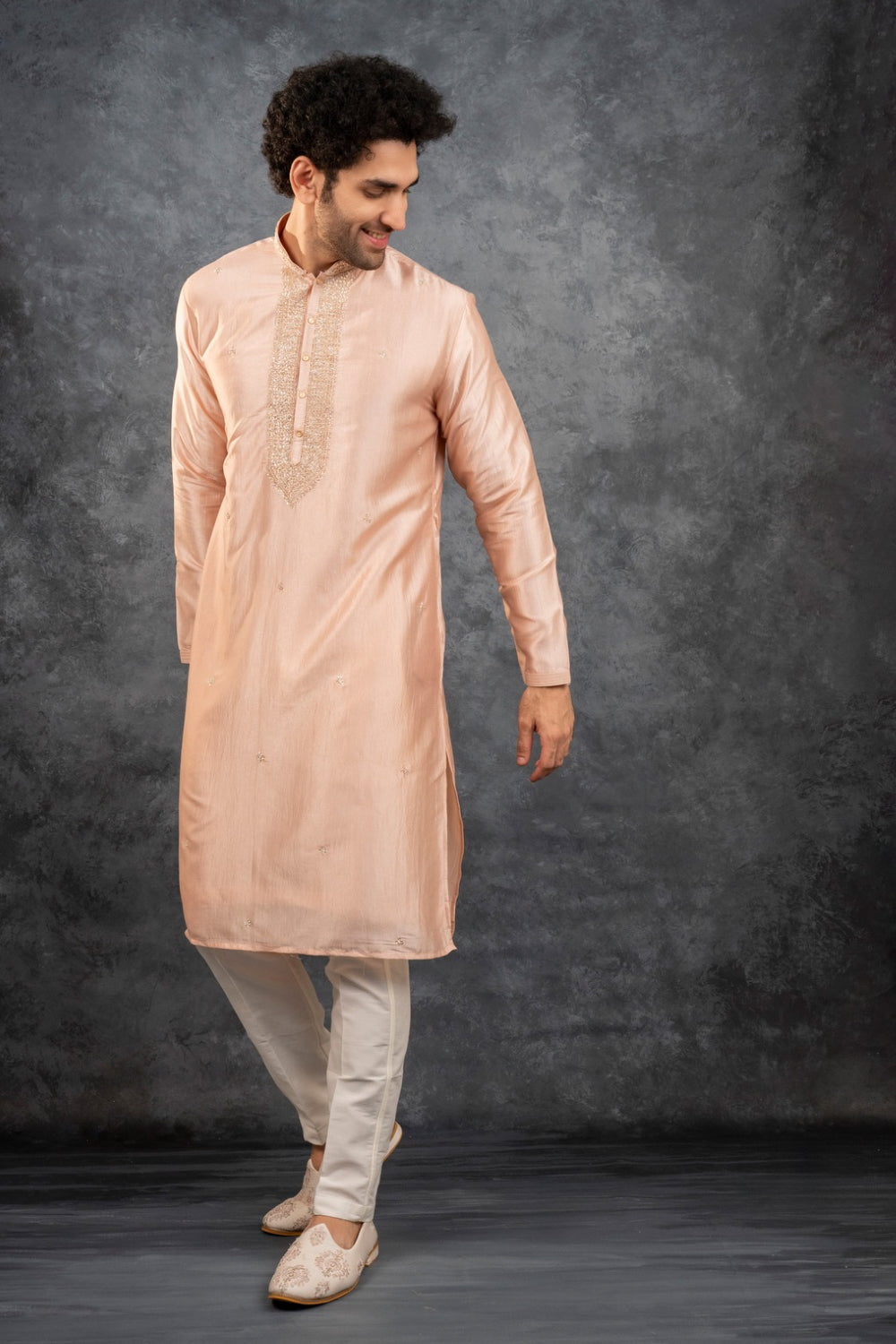 Peach silk kurta set with kasab work on the yoke