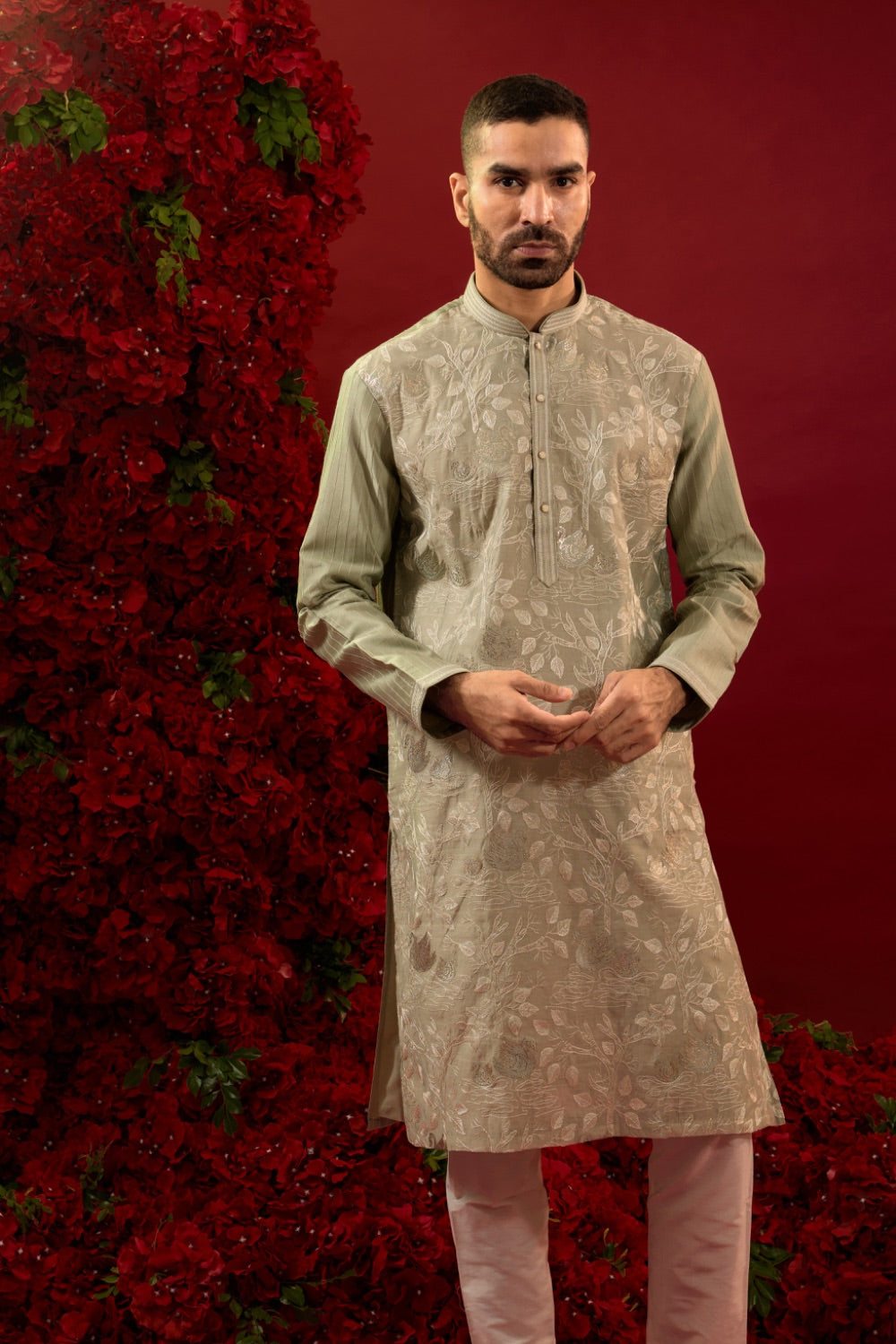 Sage green silk kurta set with machine work