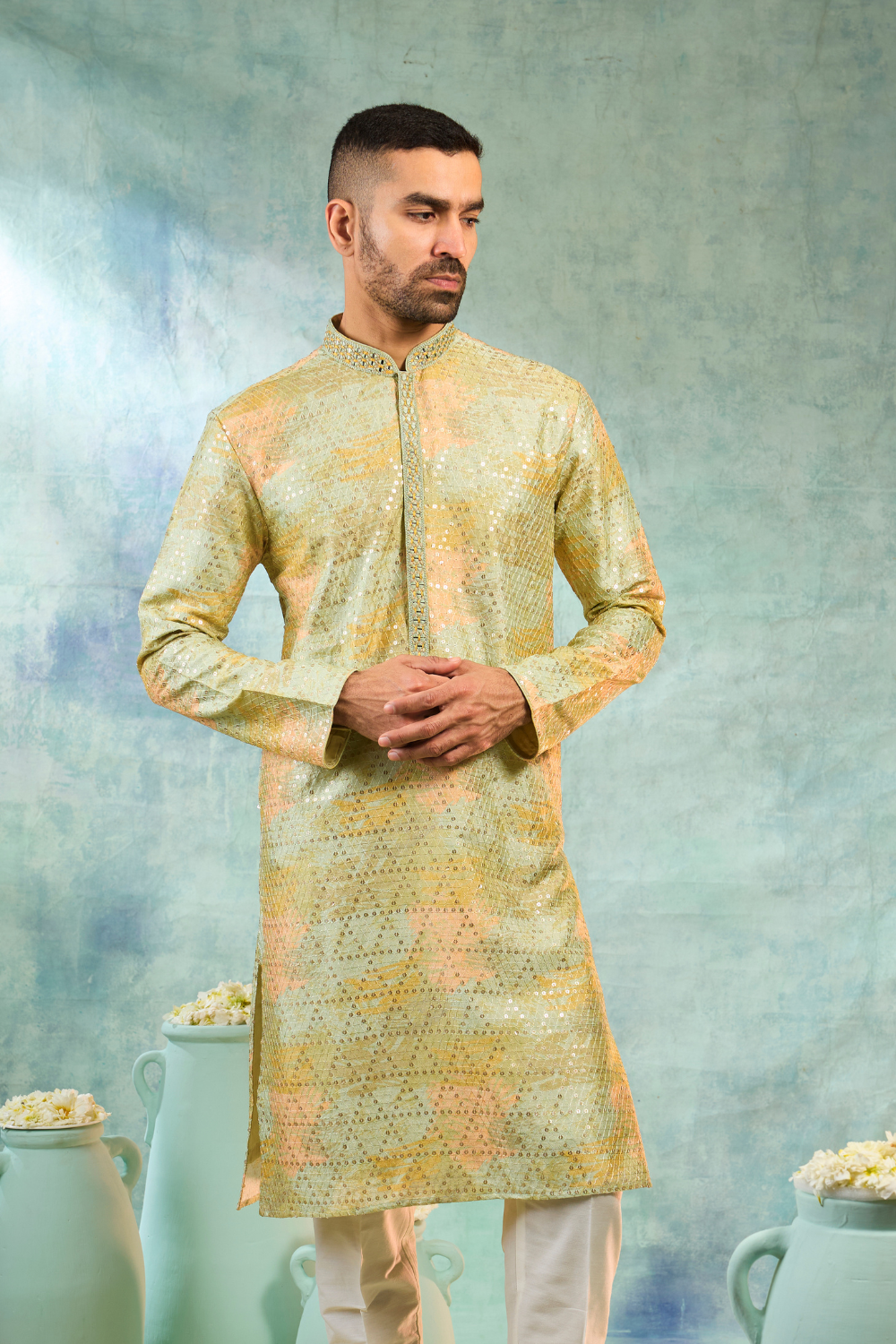 Pista green silk kurta set with thread and sequin work