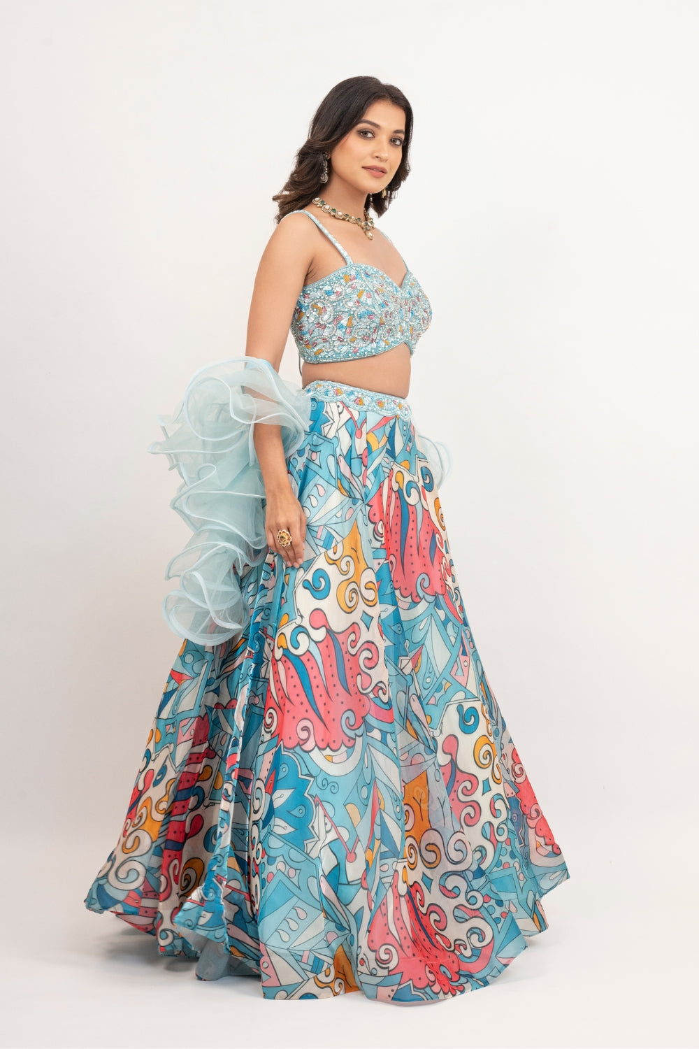 Blue organza lehenga choli with sequins work, hand cut dana work and pearls