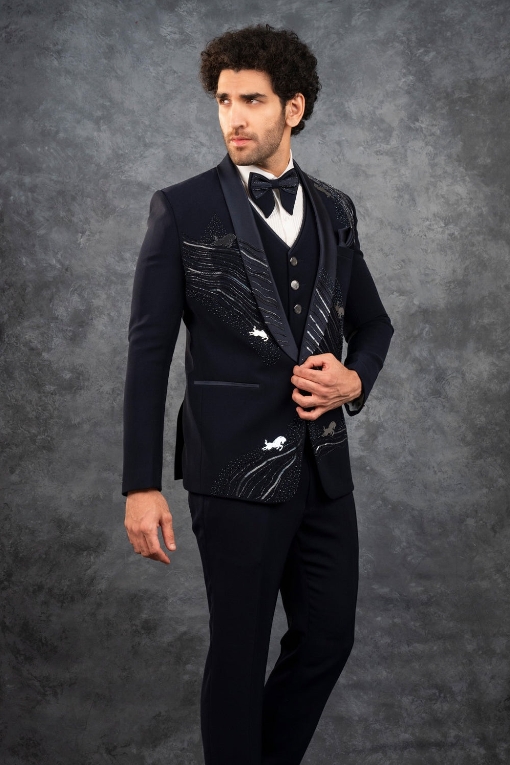 Black splendid silk tuxedo with hand cut dana and stone work