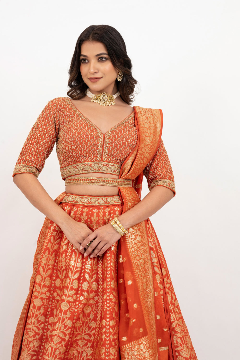 Orange banarasi silk zardozi embroidered lehenga choli with sequins work