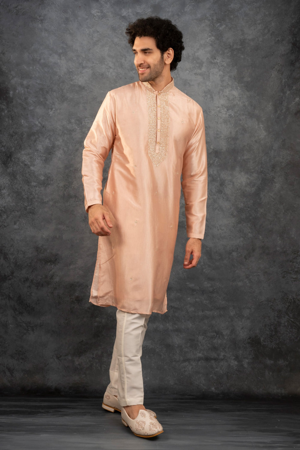 Peach silk kurta set with kasab work on the yoke