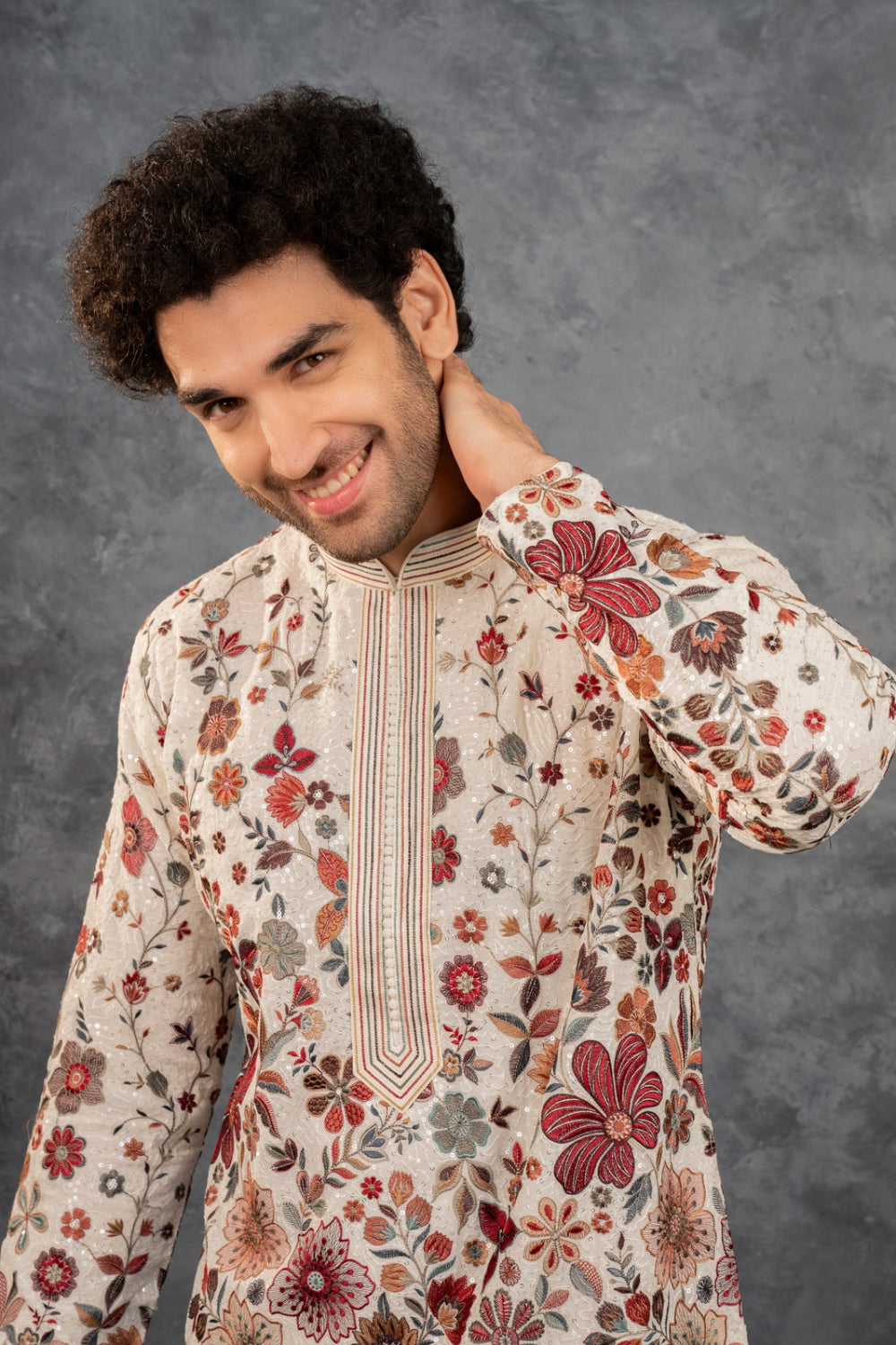 Beige silk kurta set with multicolour resham embroidery and sequins work