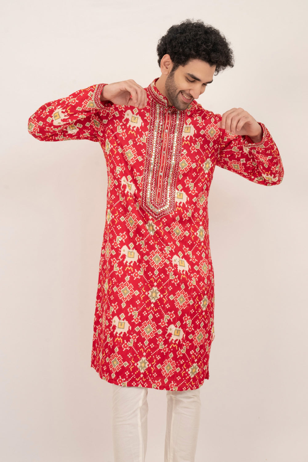 Bright red resham embroidered satin linen kurta set with kasab and mirror work