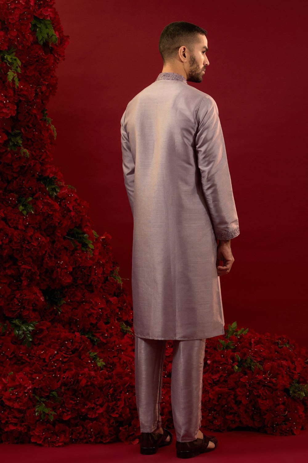 Mauve silk sherwani with detailed hand and machine work