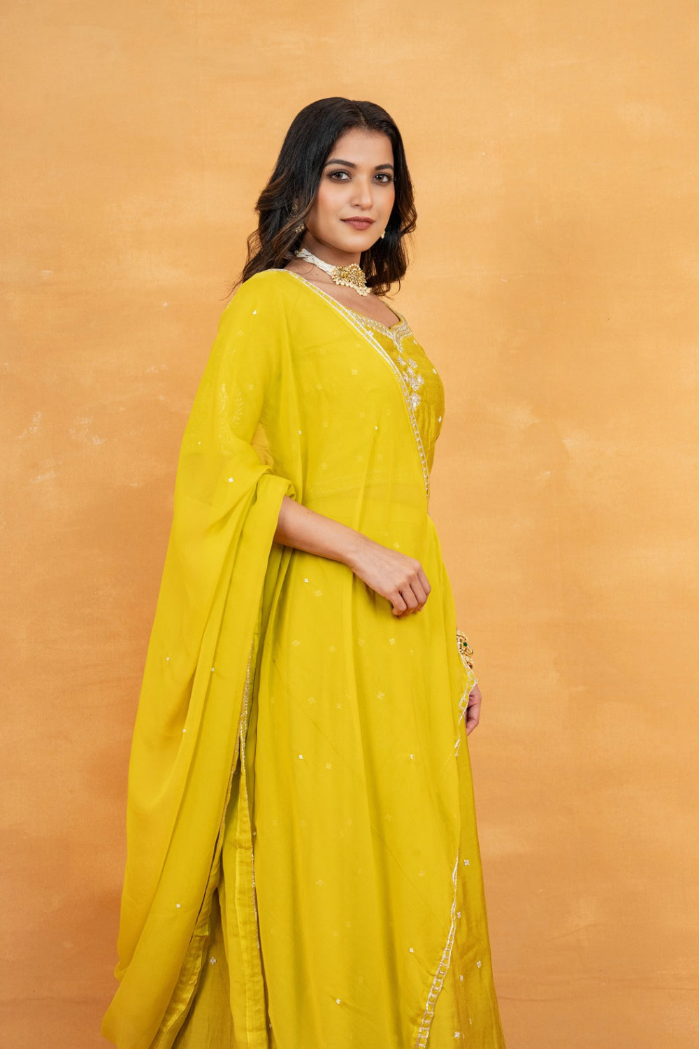 Mustard yellow soft silk zardozi embroidered lehenga choli with hand cut dana and sequin work