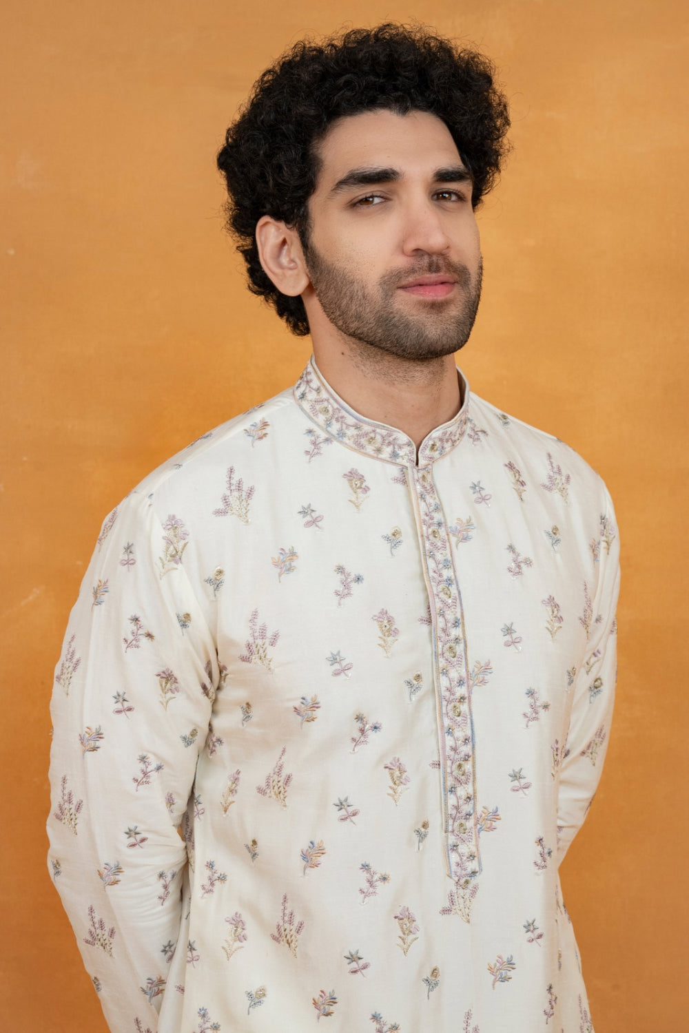 Off-White silk kurta set with resham embroidery and stone work