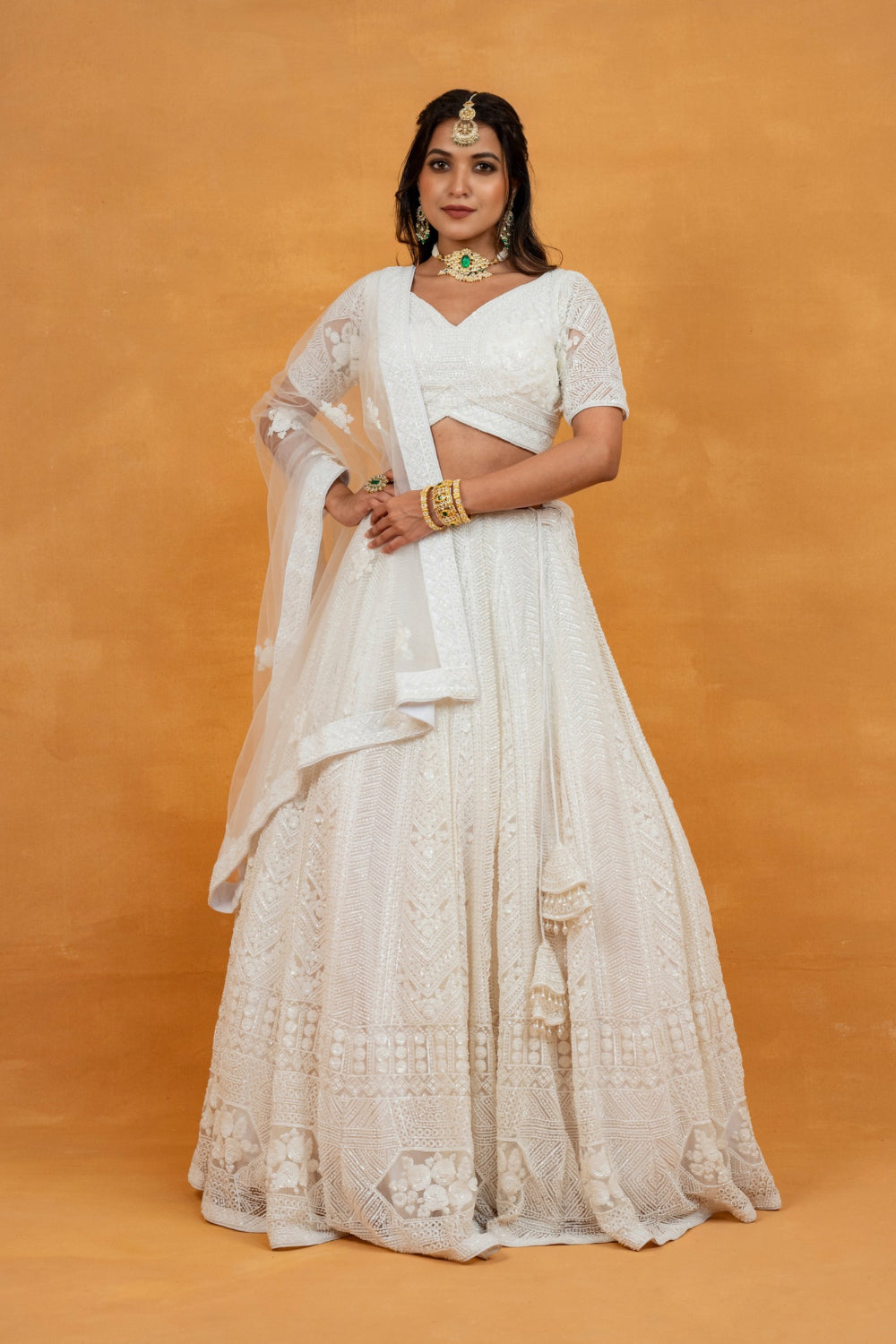 White net lehenga choli with sequin, pearl and cut dana work