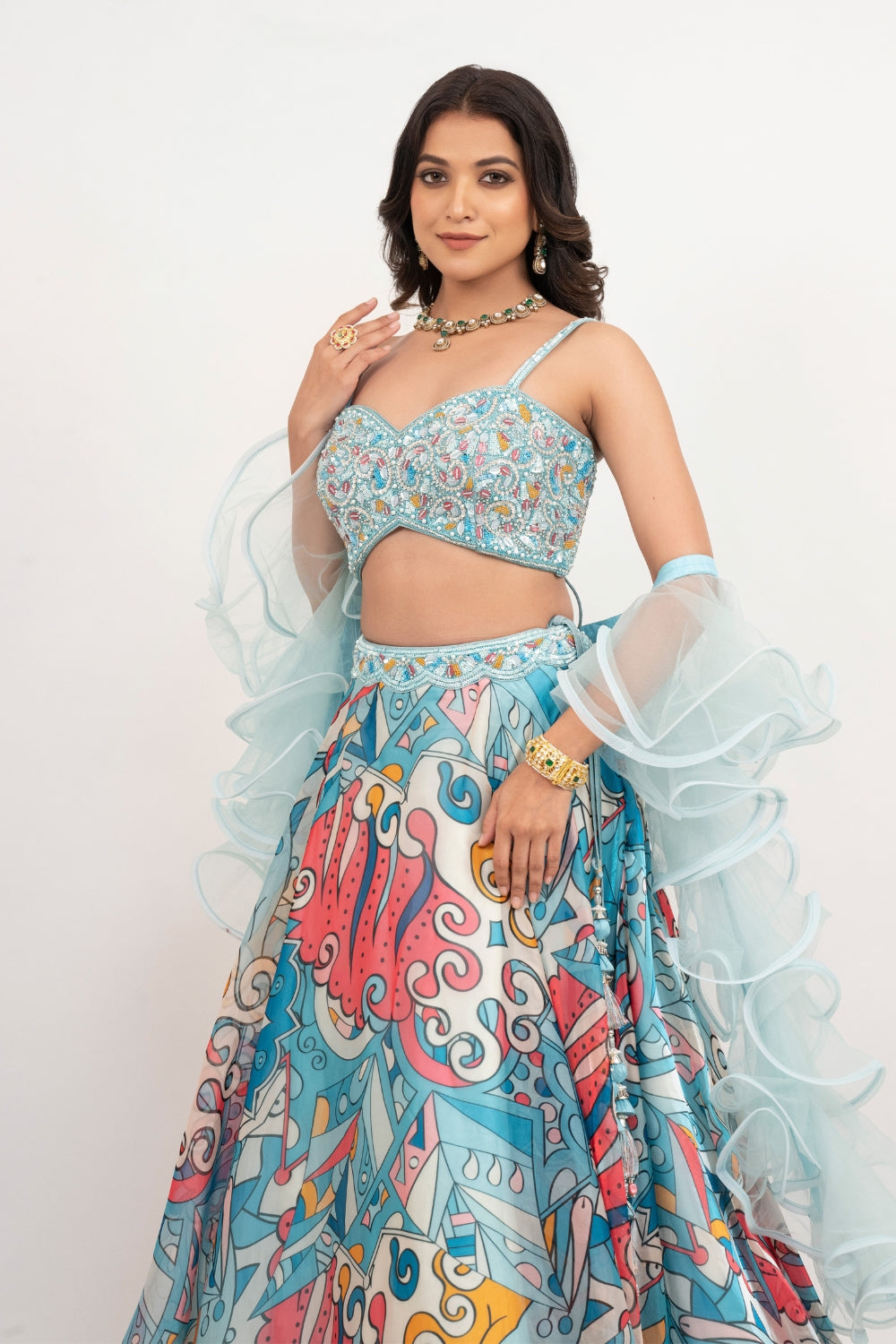 Blue organza lehenga choli with sequins work, hand cut dana work and pearls