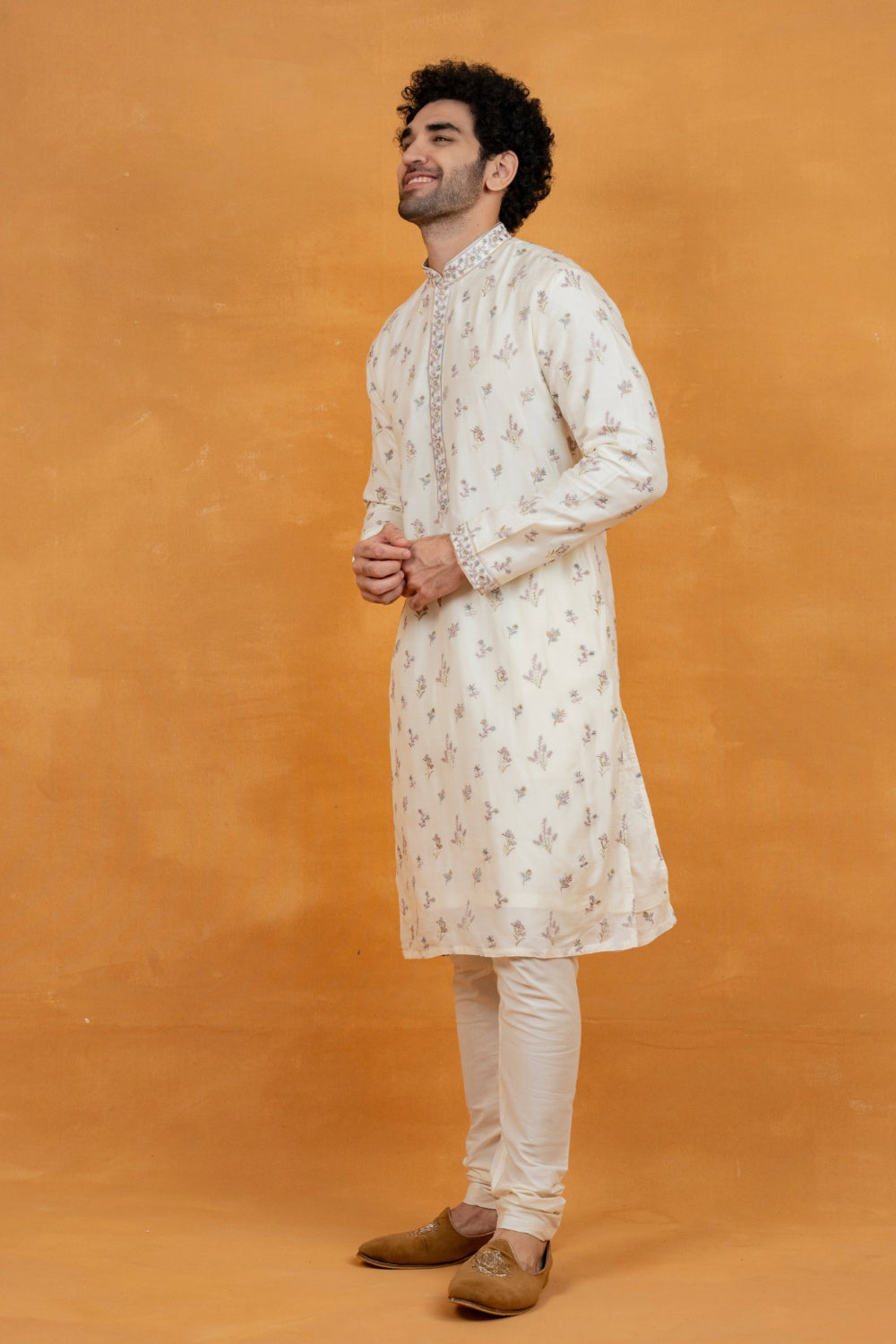 Off-White silk kurta set with resham embroidery and stone work