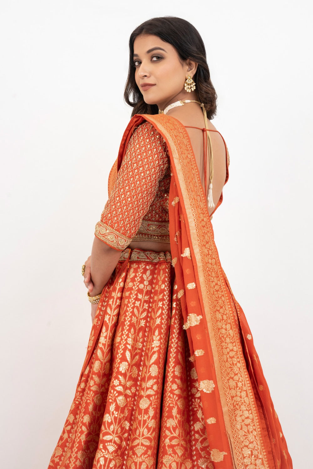 Orange banarasi silk zardozi embroidered lehenga choli with sequins work