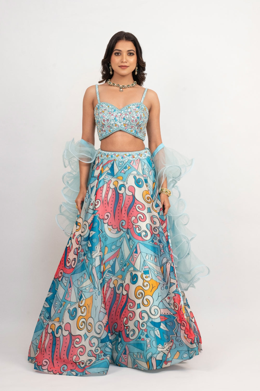 Blue organza lehenga choli with sequins work, hand cut dana work and pearls