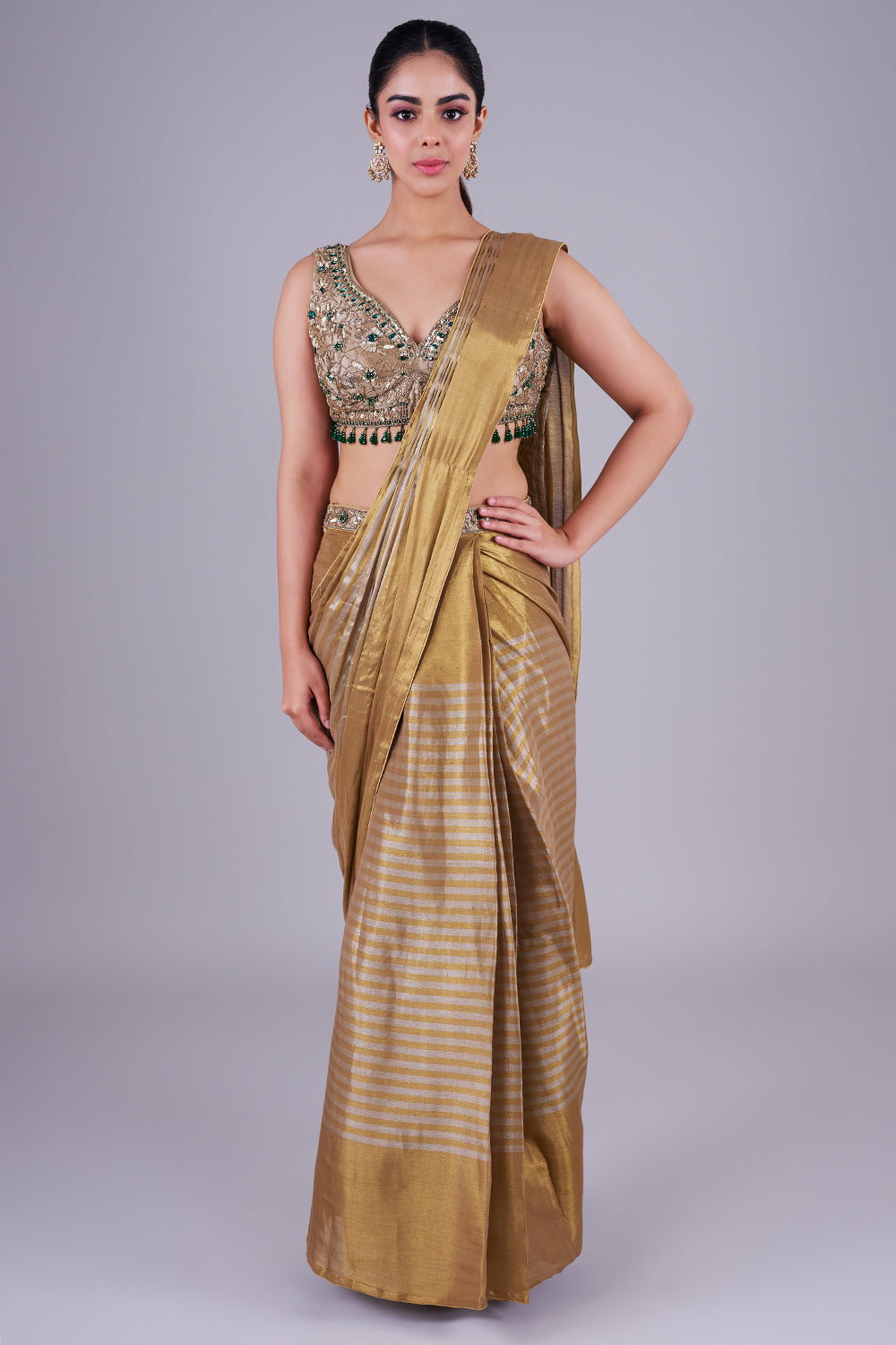 Antique gold drape with emerald blouse