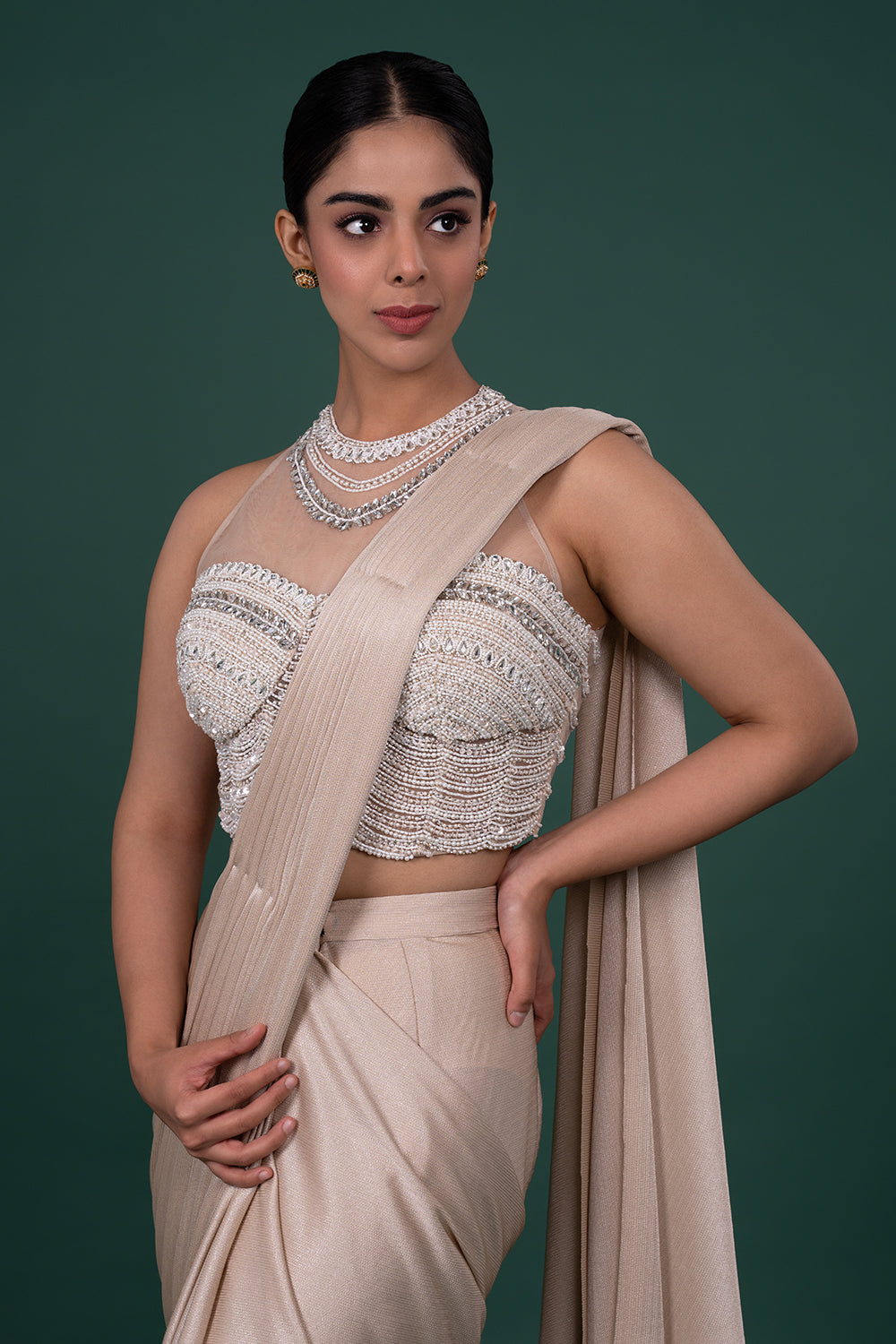 Champagne Shimmer Pre-Draped Saree in Lycra with an Embellished Illusion Neck Blouse