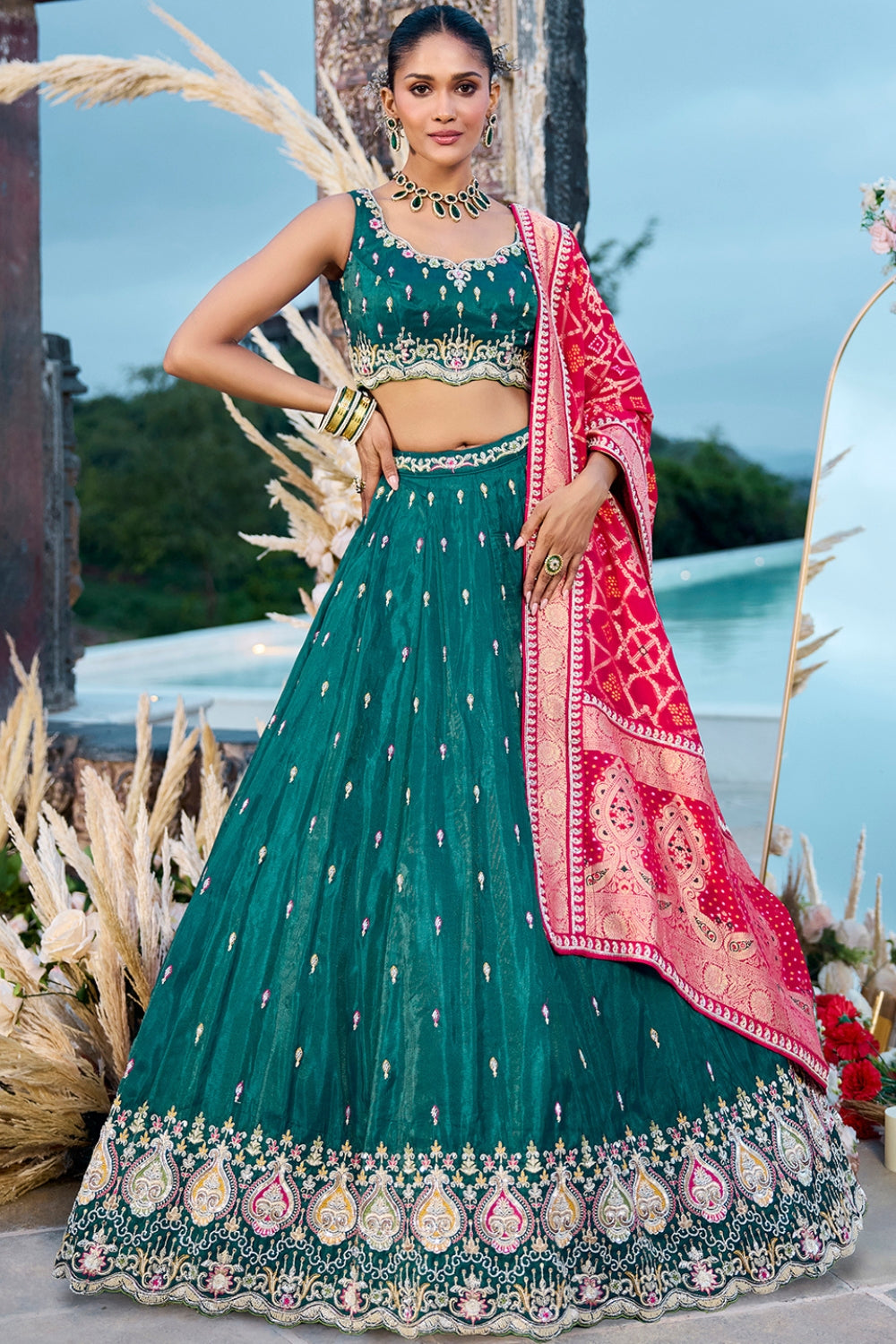 DARK GREEN SILK LEHENGA CHOLI WITH RESHAM EMBROIDERY AND CUTDANA