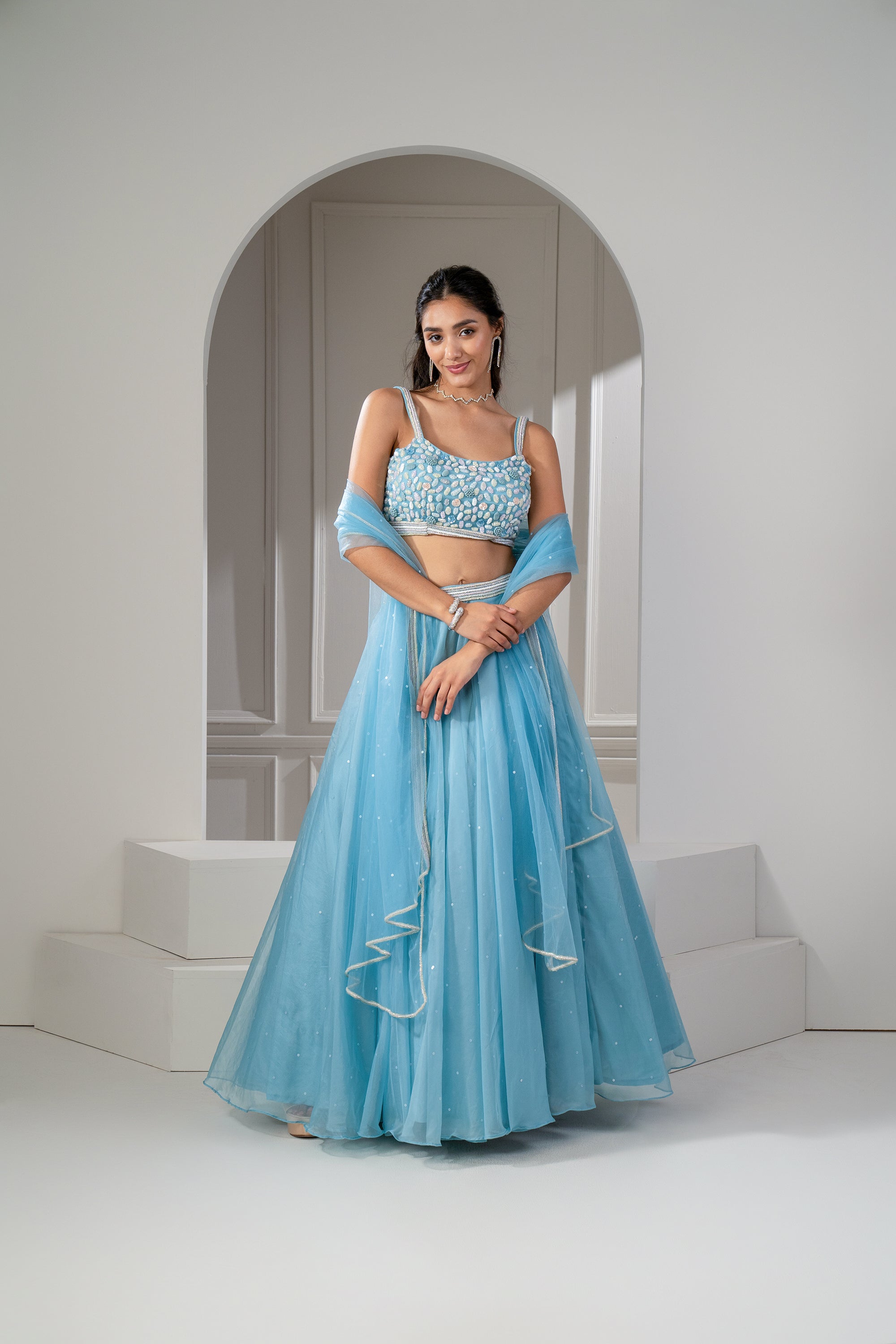 Light Blue Color Soft Net Base Lehenga With Stone And Mirror Work