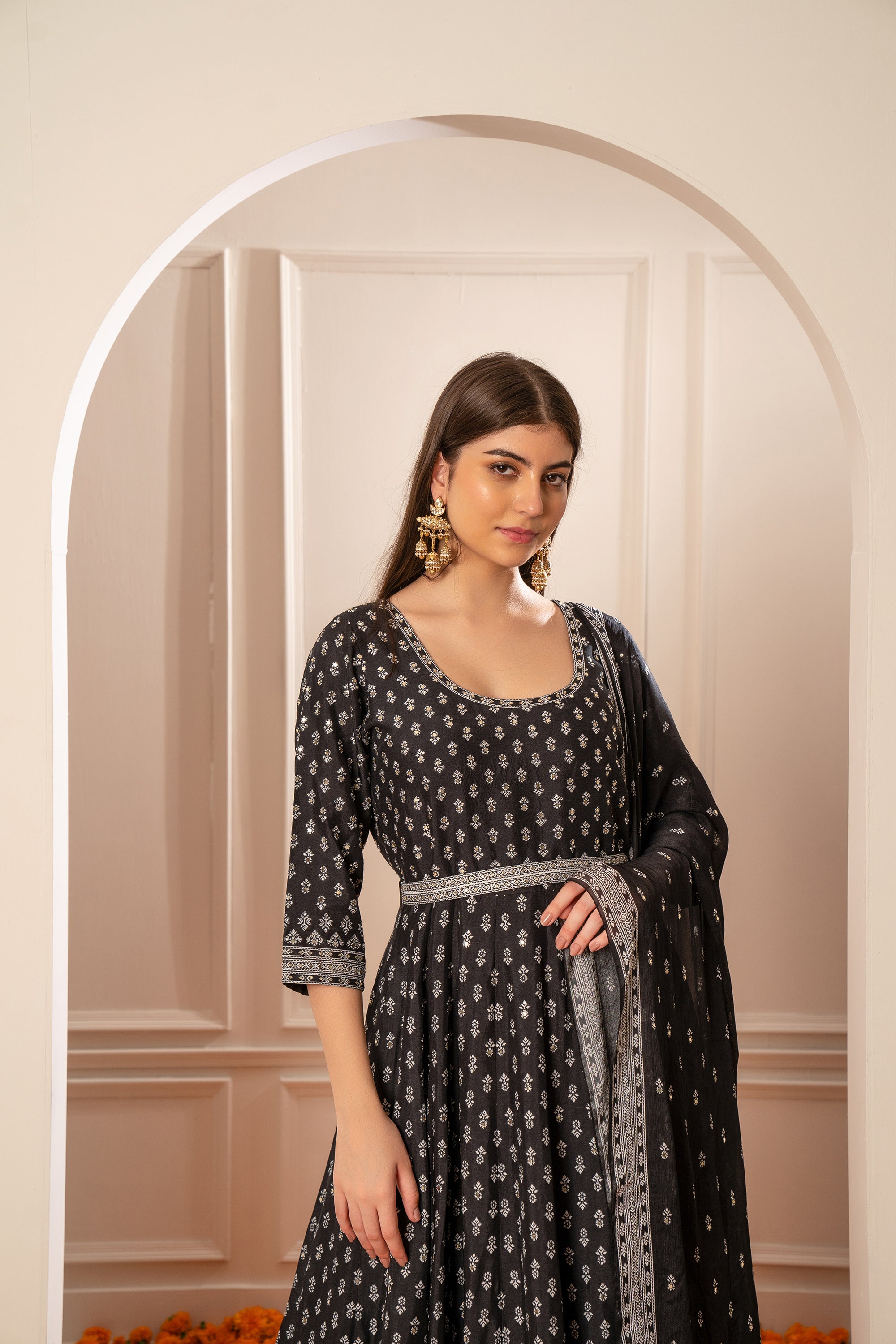 Charcoal Black Semi Silk Printed Gown with Mirror Embellishments.