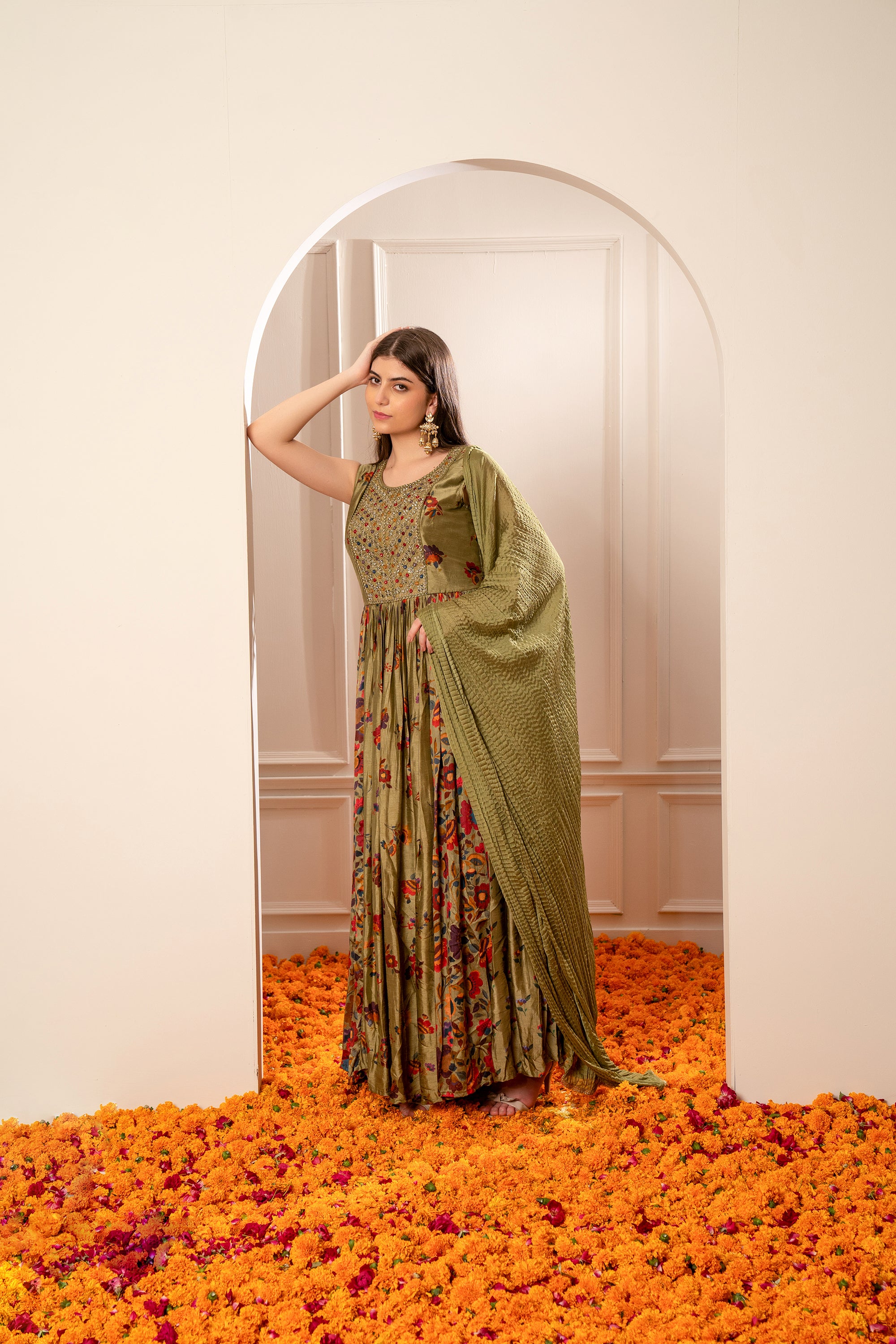 Mehendi Green Silk Gown with Mirror Embellishments.