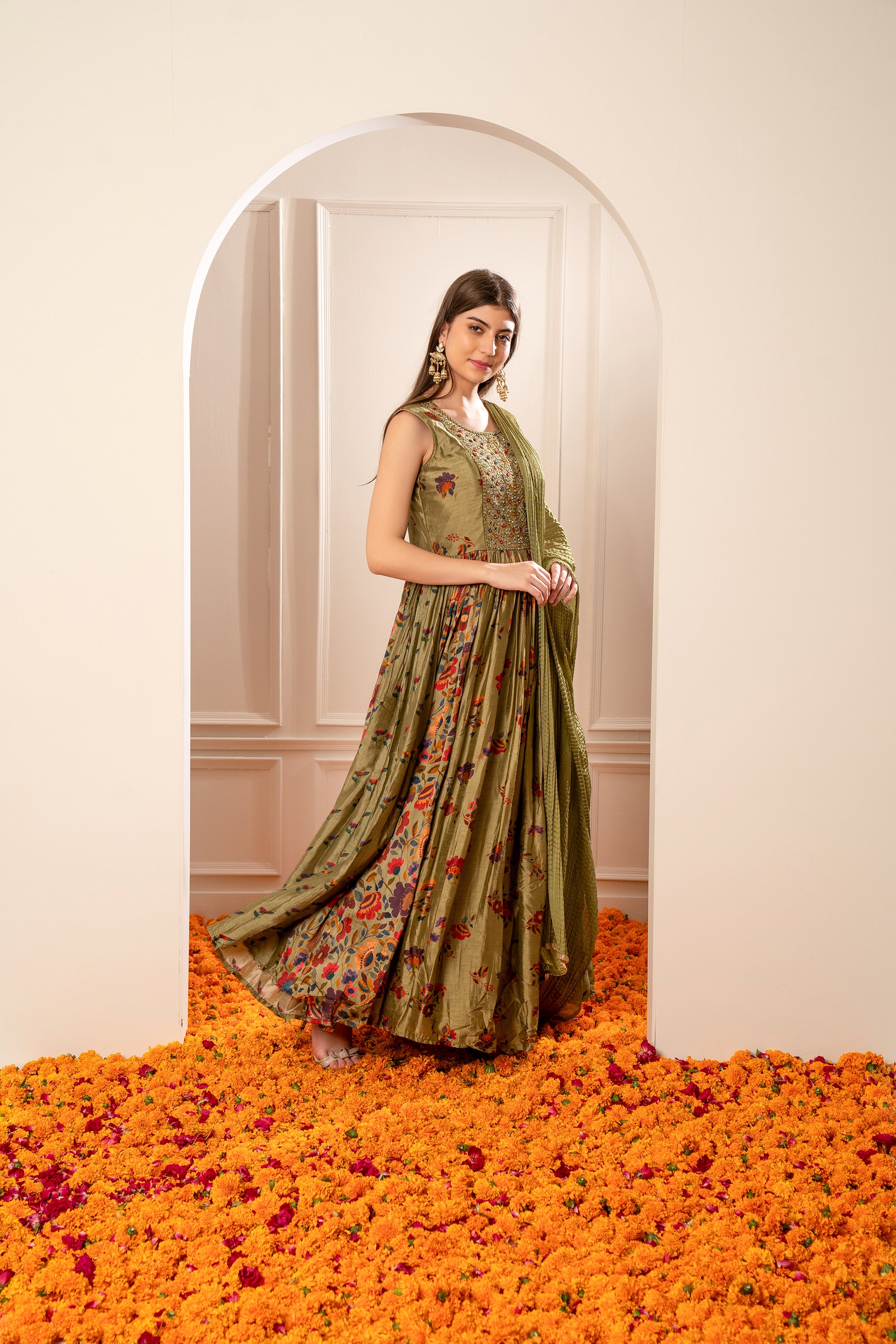 Mehendi Green Silk Gown with Mirror Embellishments.