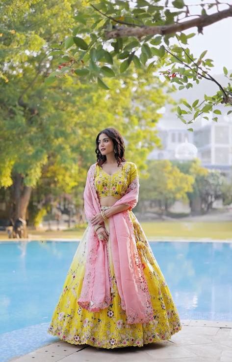 Bright yellow silk lehenga with thread work