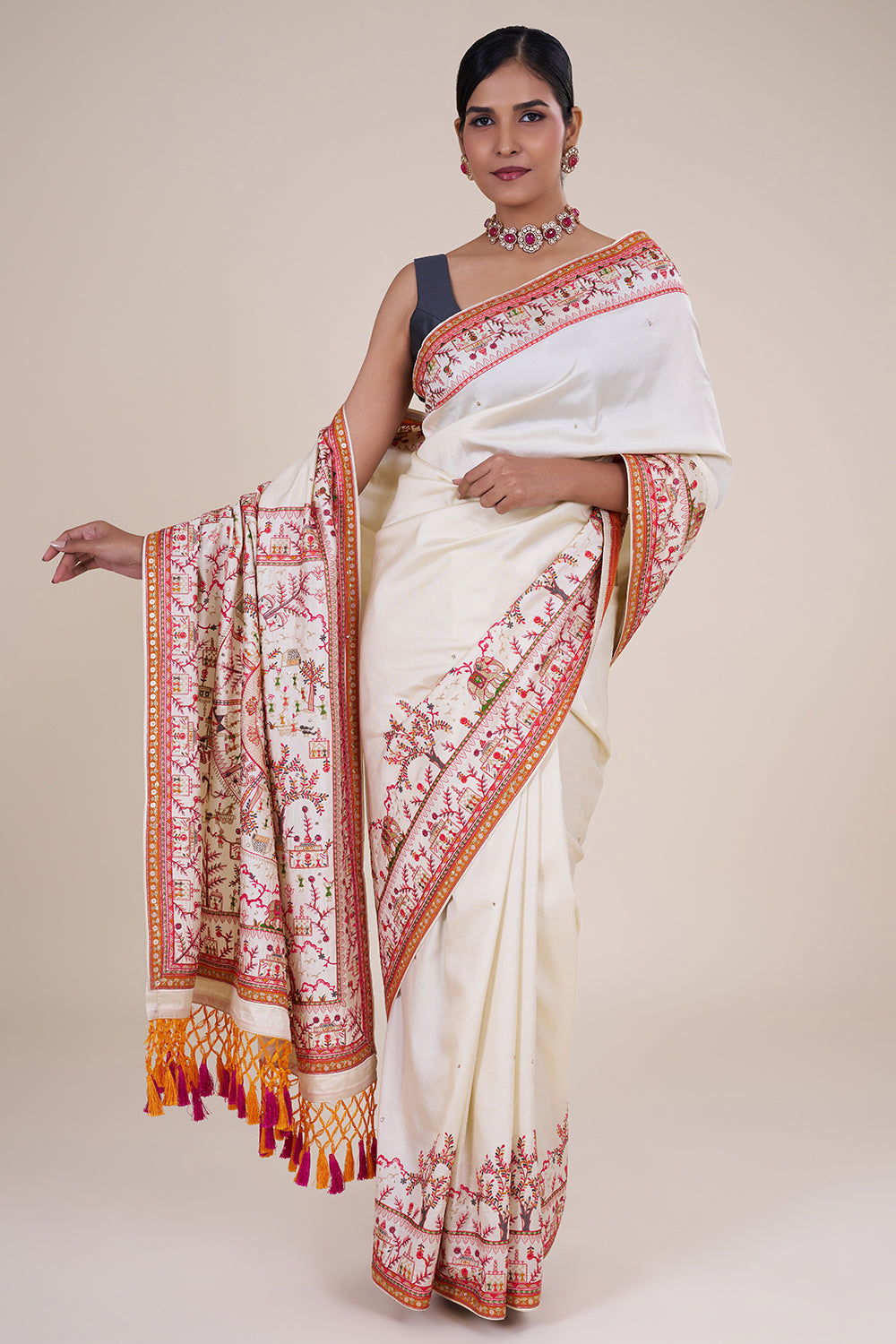 White folk-embroidered silk saree