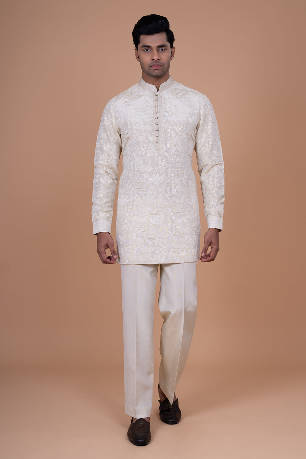 Ivory Raw Silk Bundi Jacket with Pastel Floral Thread Work and Mirror Accents.