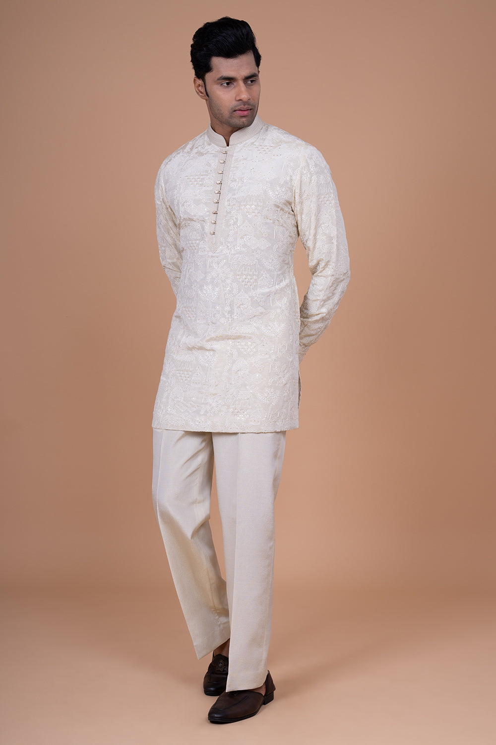 Ivory Raw Silk Bundi Jacket with Pastel Floral Thread Work and Mirror Accents.