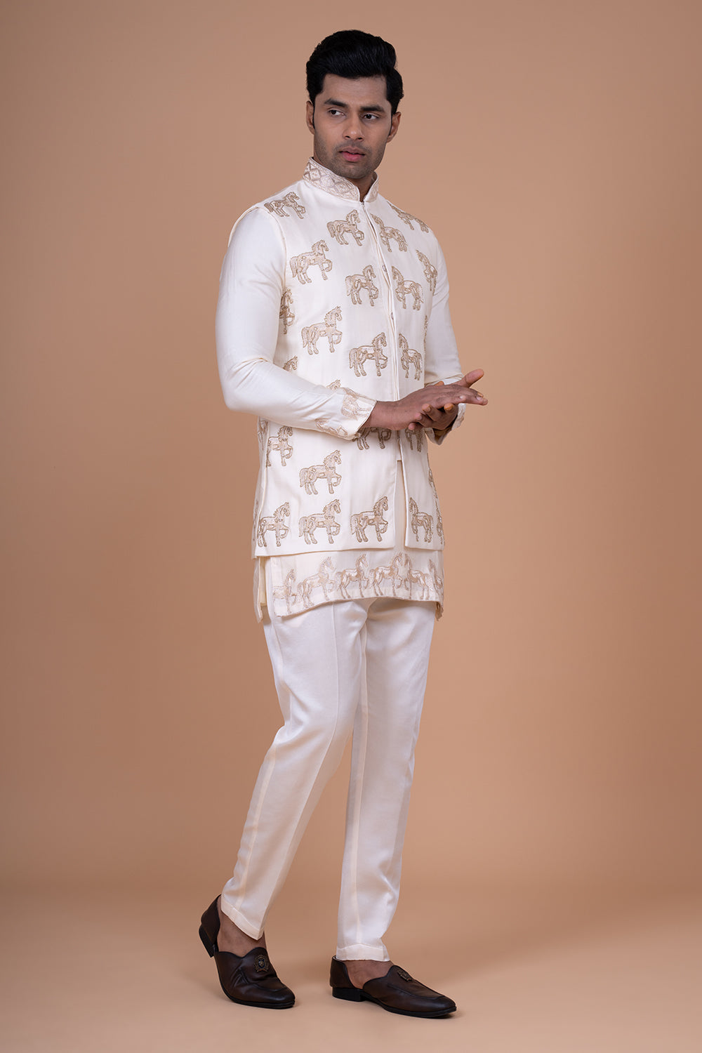Ivory Raw Silk Sleeveless Bundi Jacket with Gold Zari Horse Embroidery.