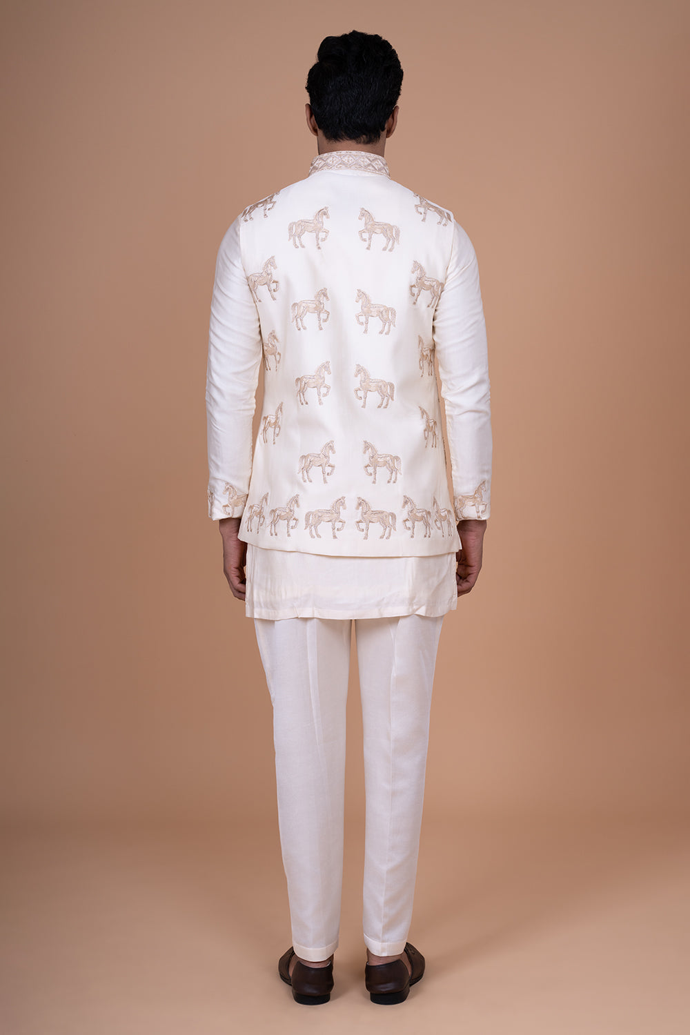 Ivory Raw Silk Sleeveless Bundi Jacket with Gold Zari Horse Embroidery.