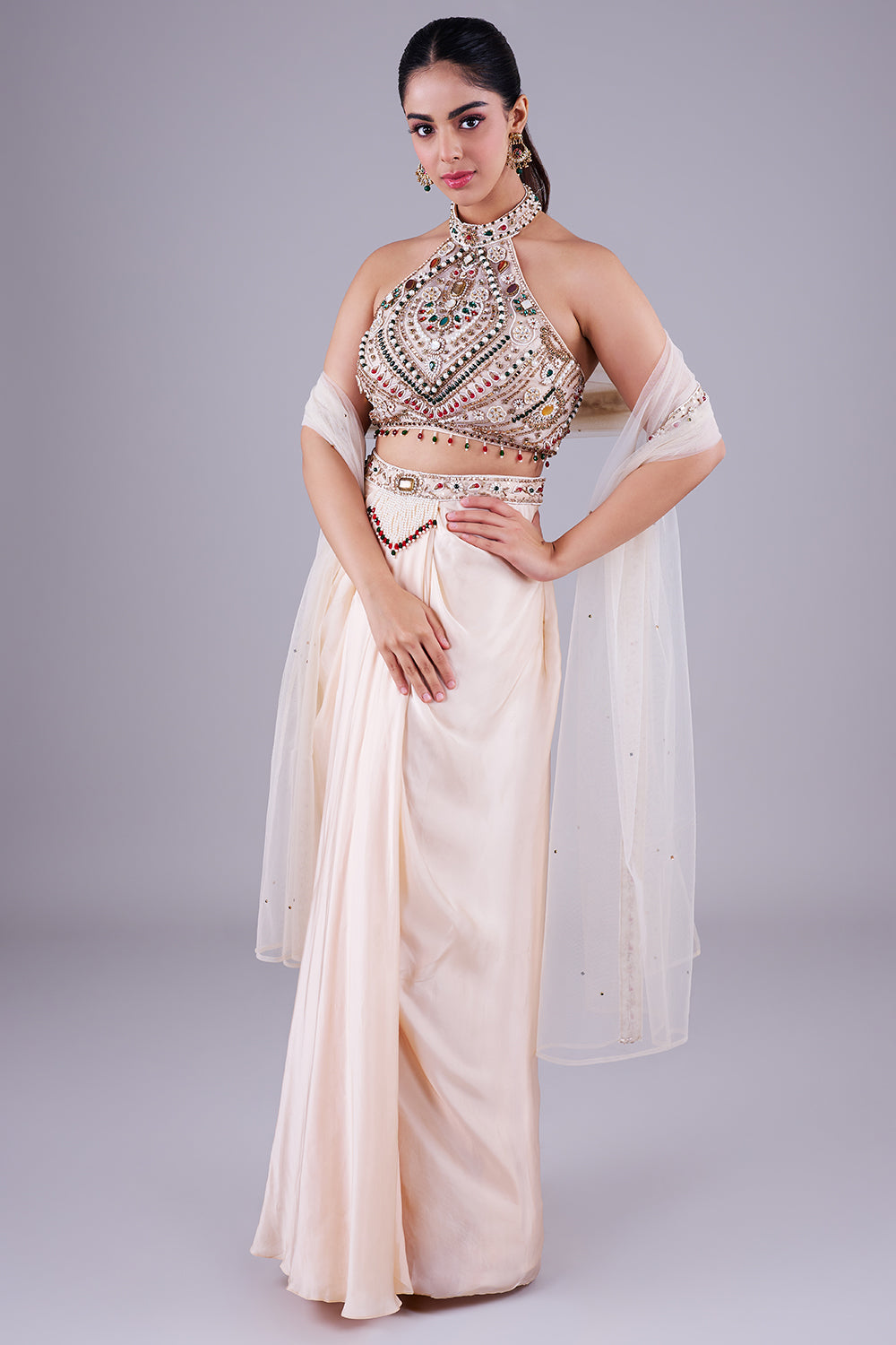 Ivory embellished halter with draped skirt