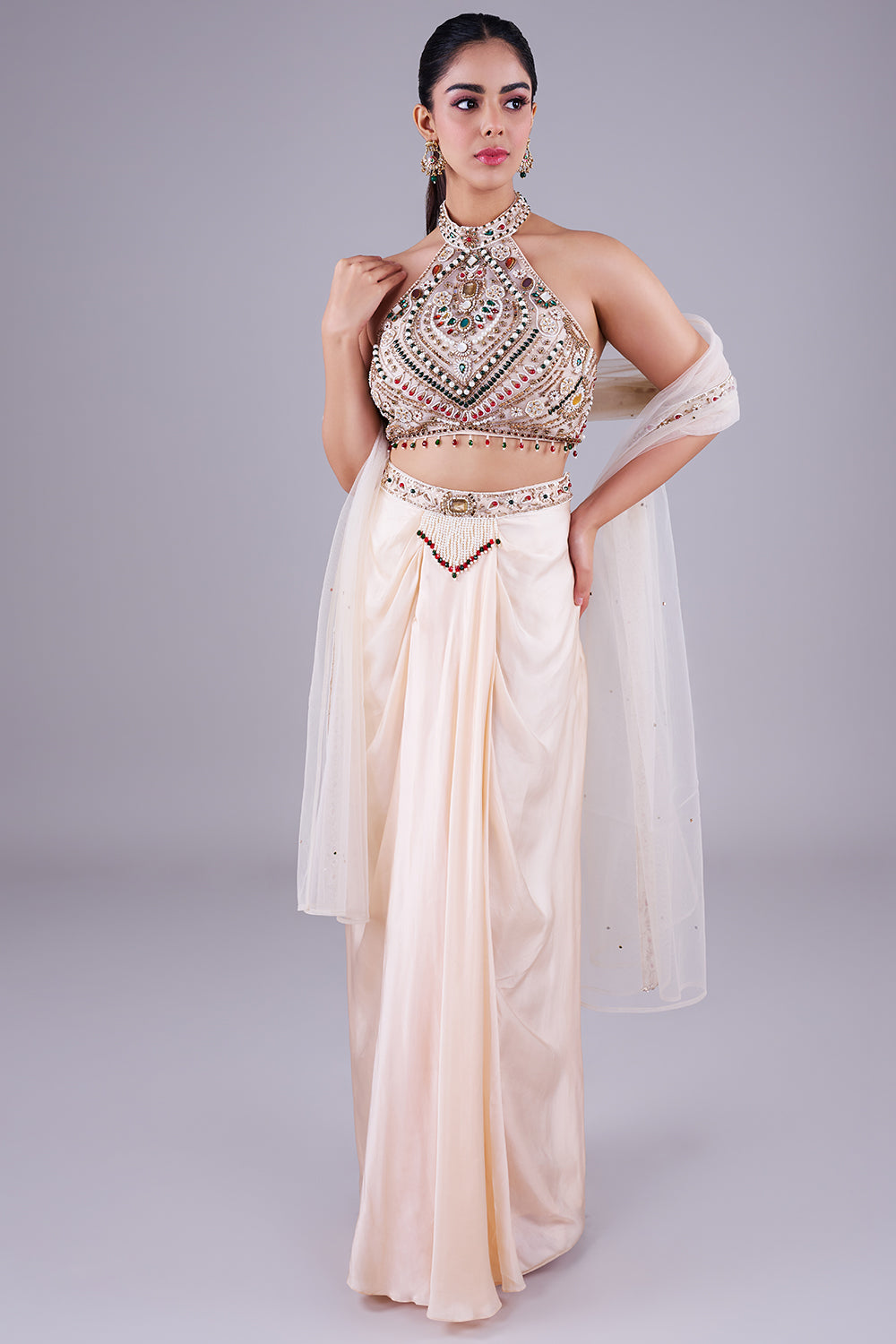 Ivory embellished halter with draped skirt